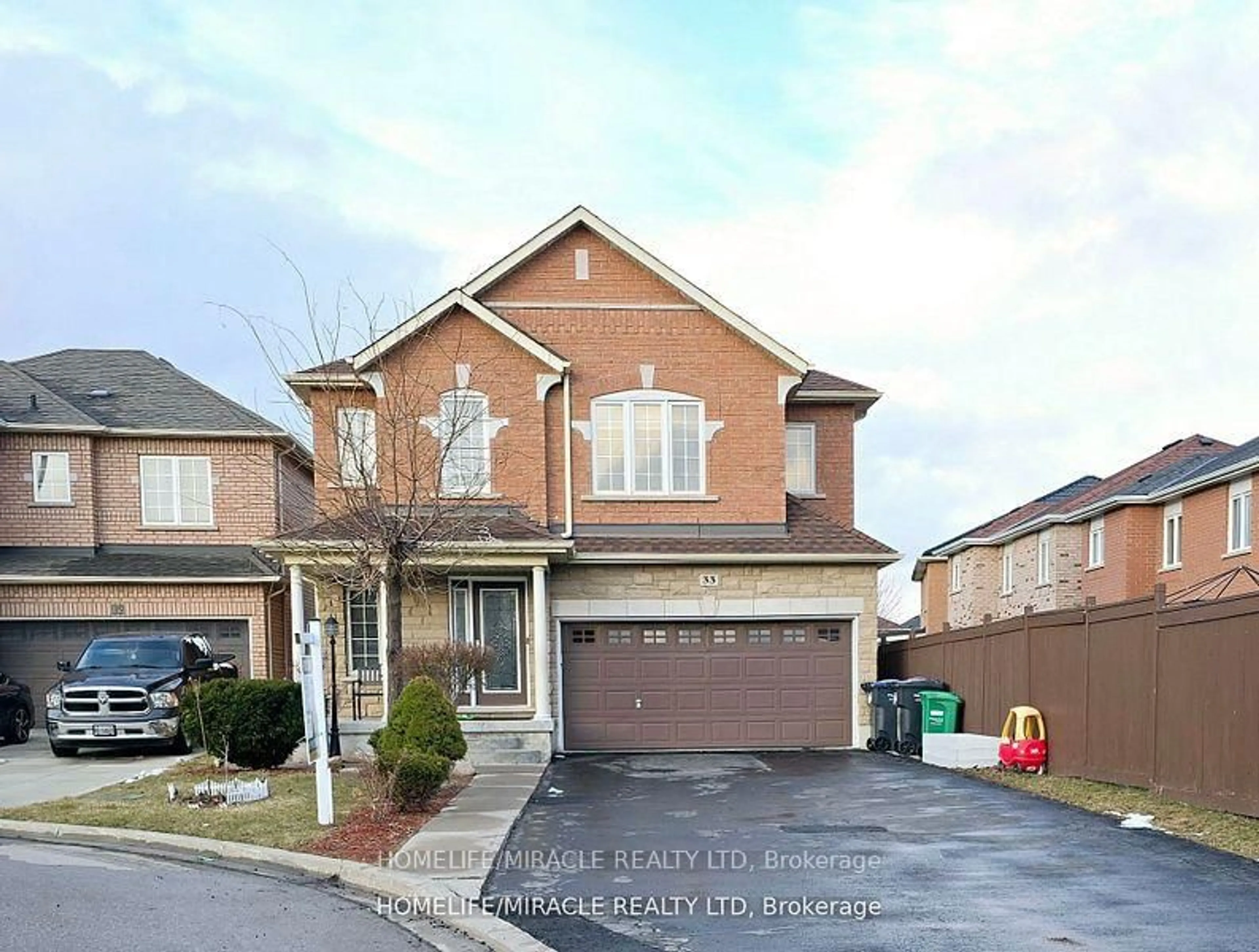 Home with brick exterior material, street for 33 Atira Ave, Brampton Ontario L7A 3V1