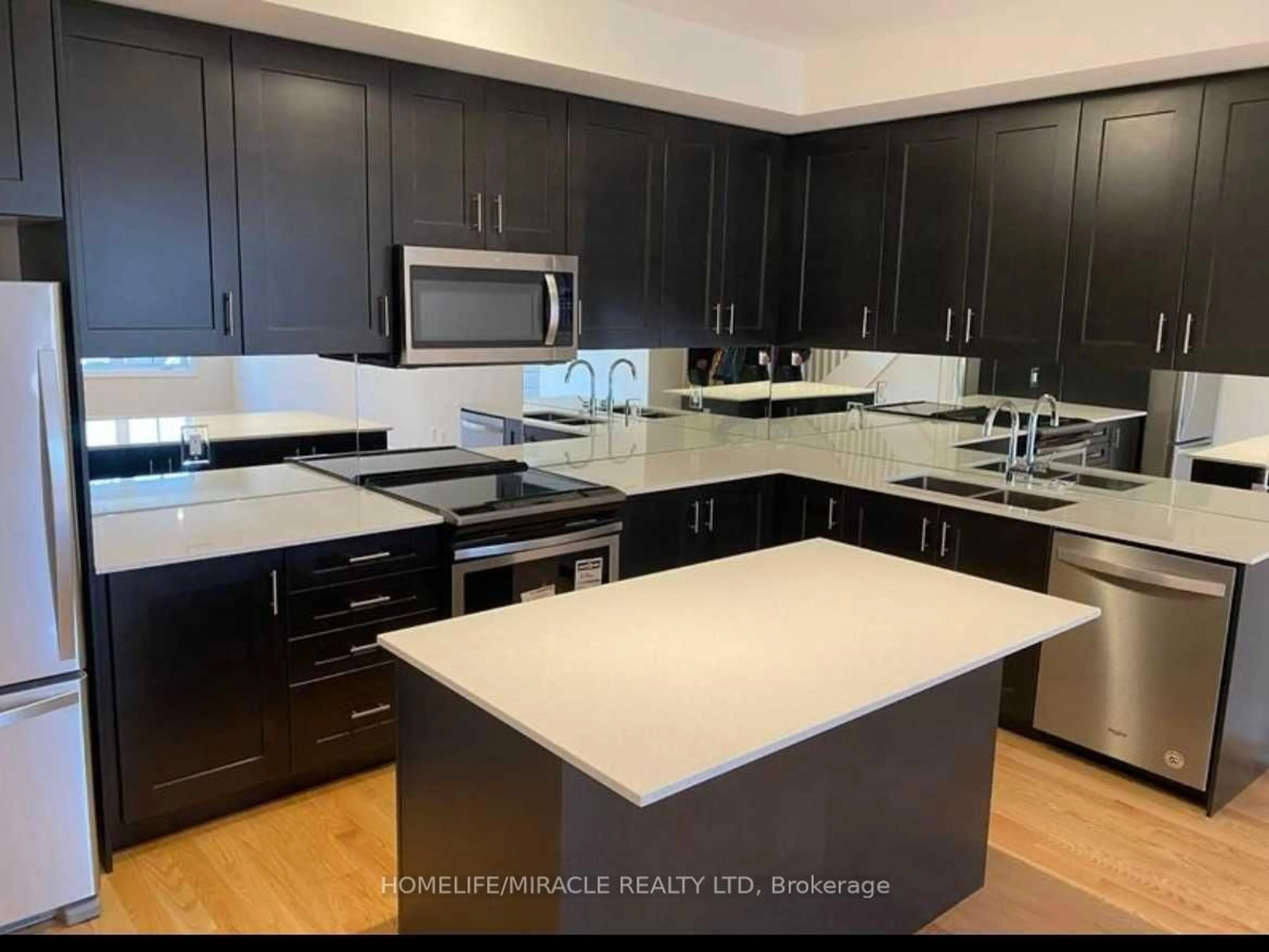 Open concept kitchen, unknown for 1205 Gooseberry Lane #409, Mississauga Ontario L5G 0B9