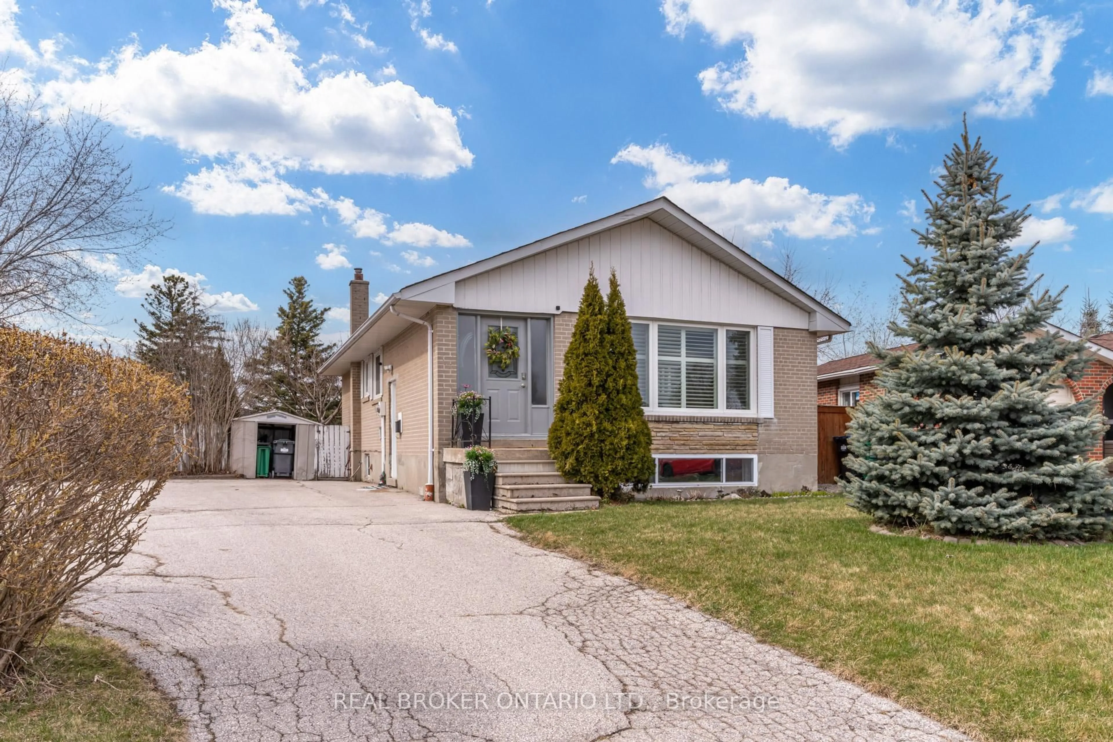 Home with vinyl exterior material, street for 50 Epsom Downs Dr, Brampton Ontario L6T 1Y8