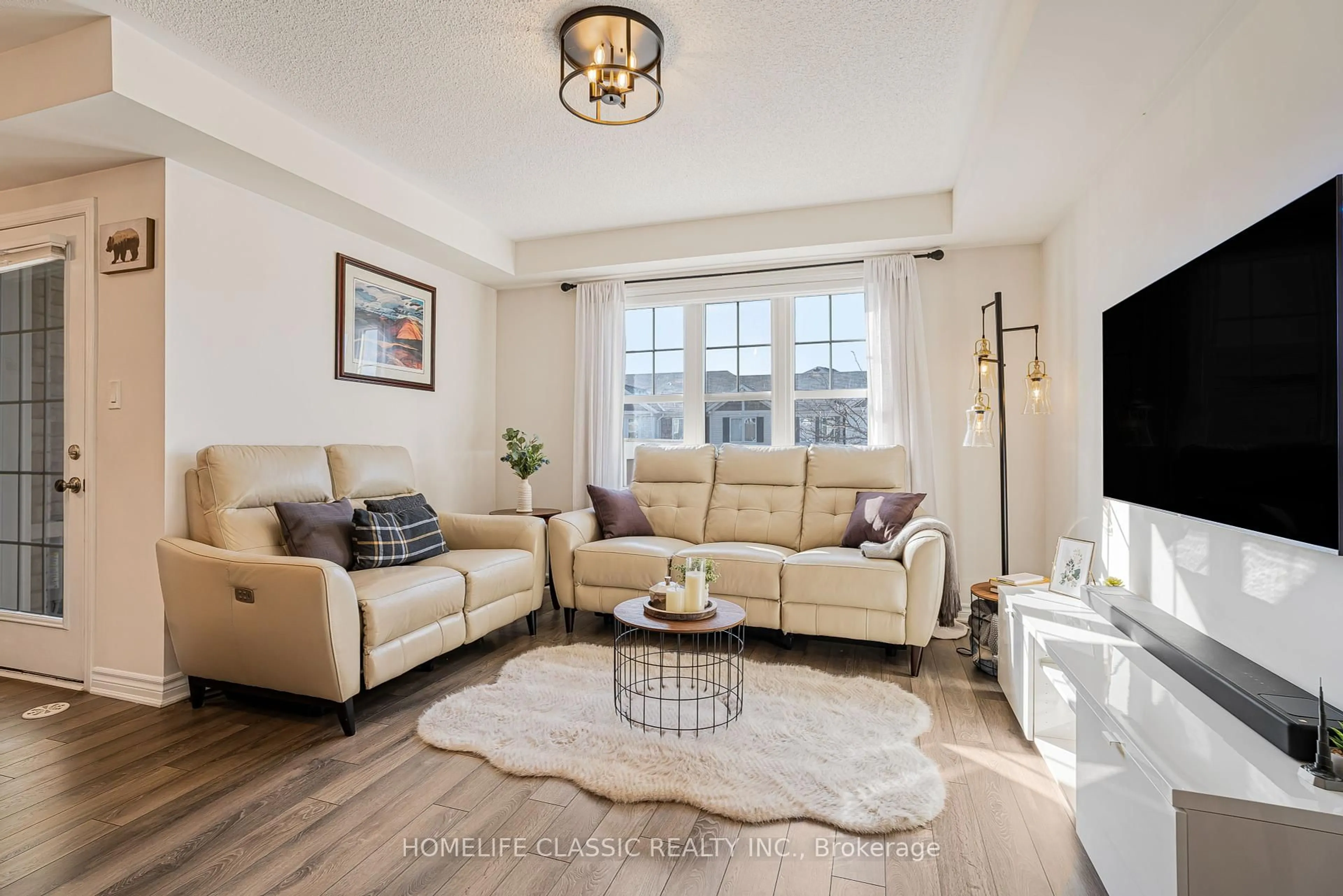 Living room with furniture, unknown for 1745 Copeland Circ, Milton Ontario L9T 8X8