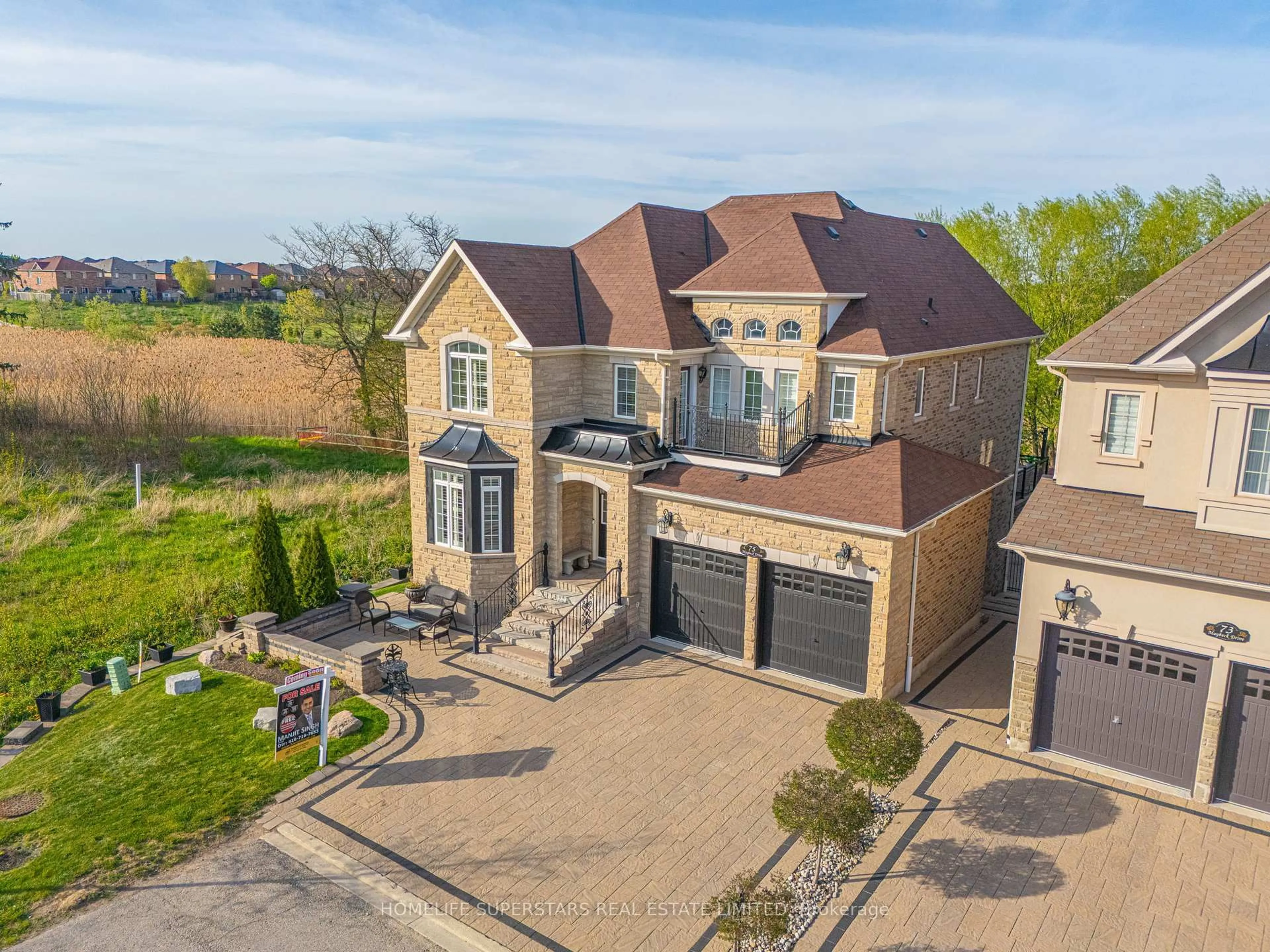 A pic from outside/outdoor area/front of a property/back of a property/a pic from drone, street for 75 Maybeck Dr, Brampton Ontario L6X 0Y8