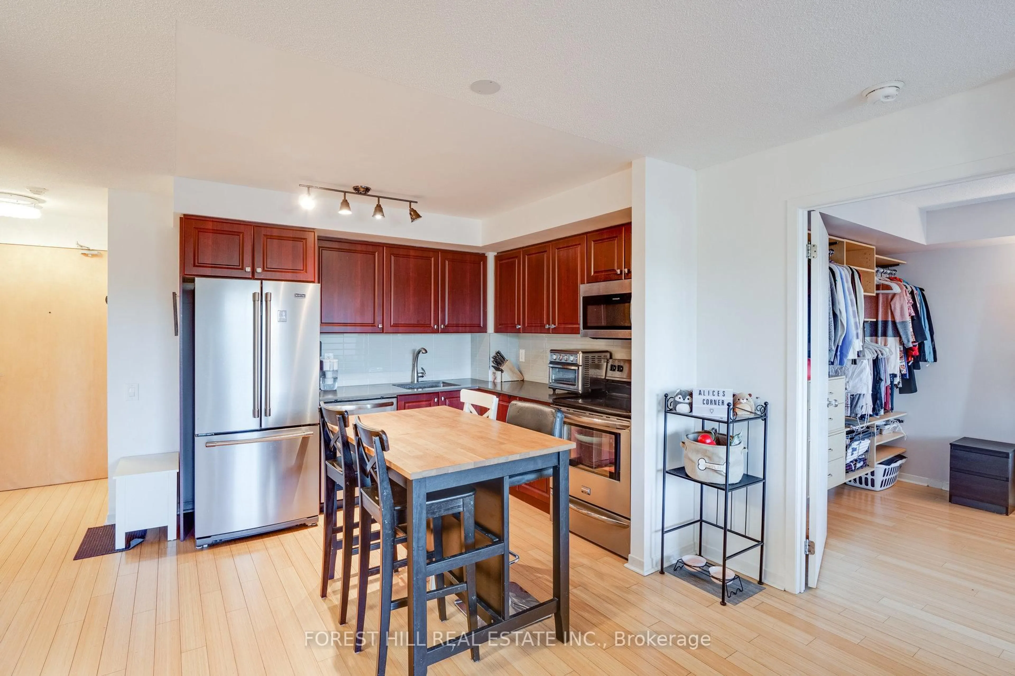 Open concept kitchen, wood/laminate floor for 1040 The Queensway Ave #301, Toronto Ontario M8Z 0A7