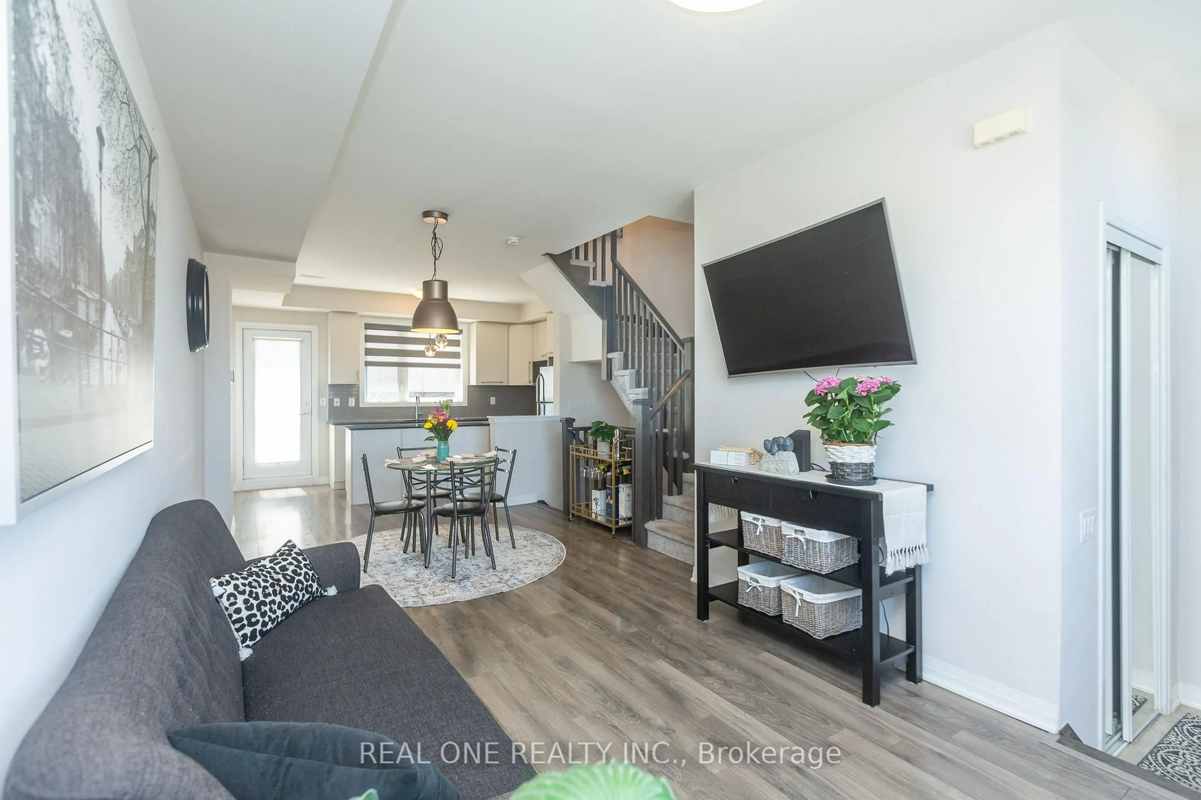Open concept kitchen, wood/laminate floor for 203 Downsview Park Blvd, Toronto Ontario M3K 0C8