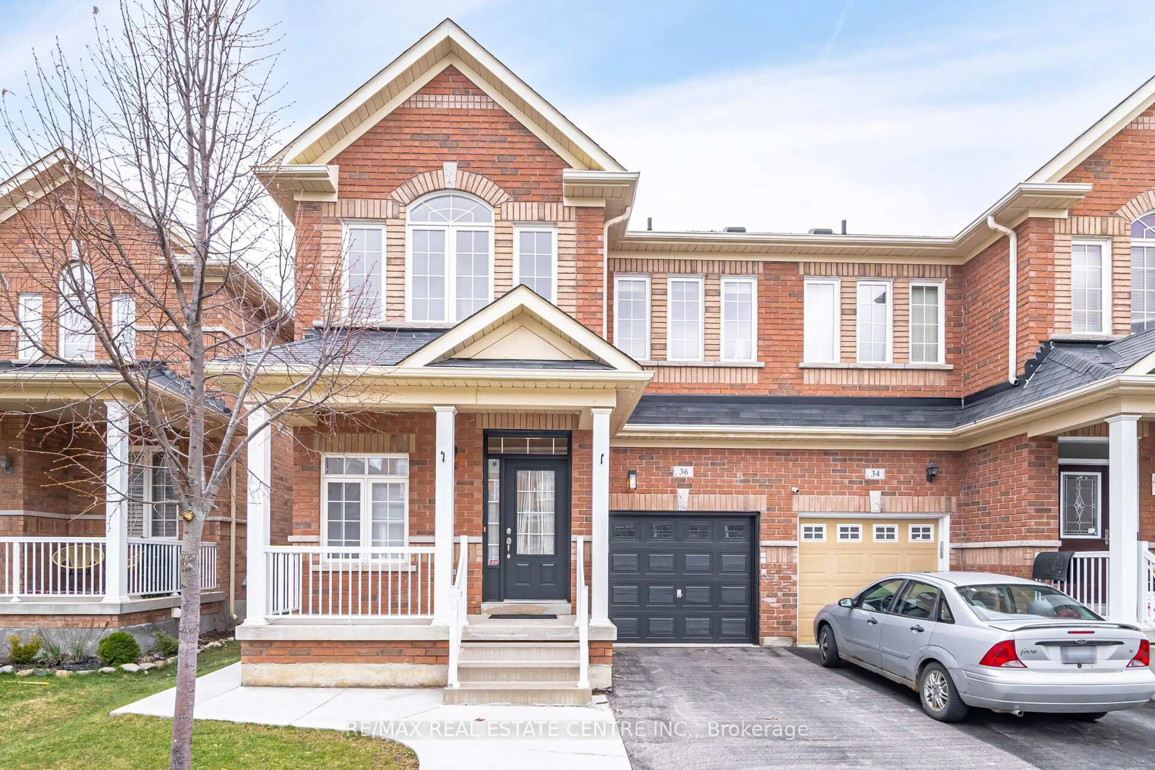 Home with brick exterior material, street for 36 Callalily Rd, Brampton Ontario L7A 0M2