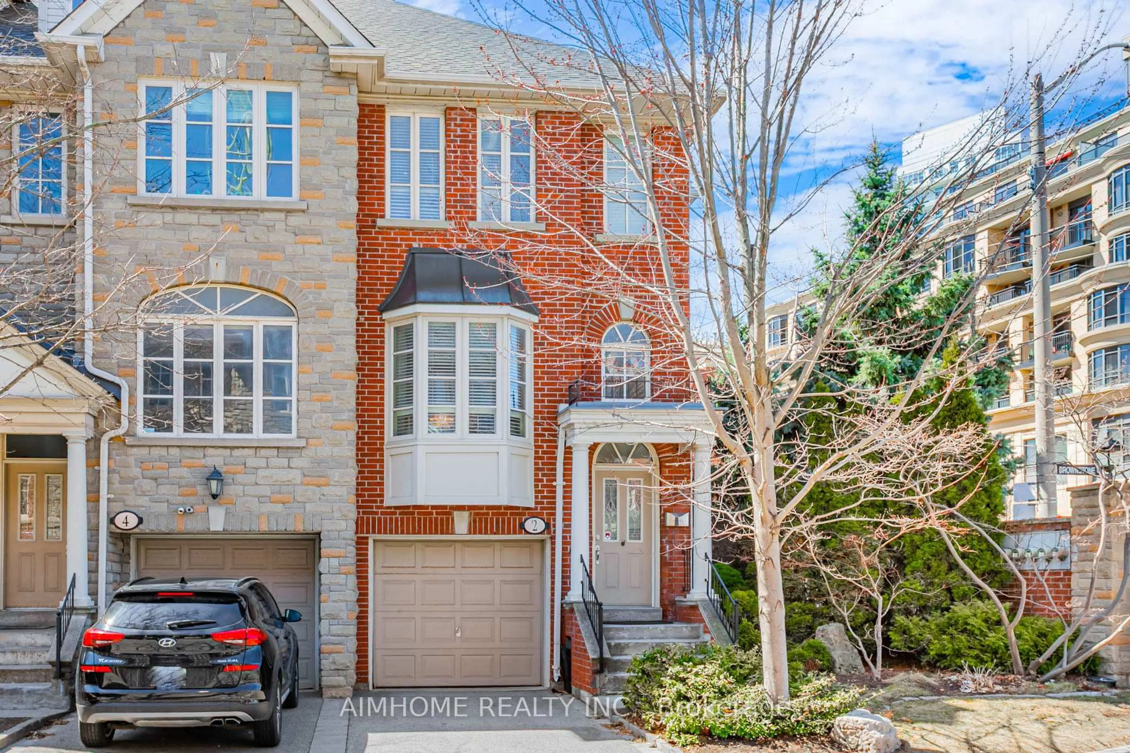 Home with brick exterior material, street for 2 Brownstone Lane, Toronto Ontario M8X 2Z6