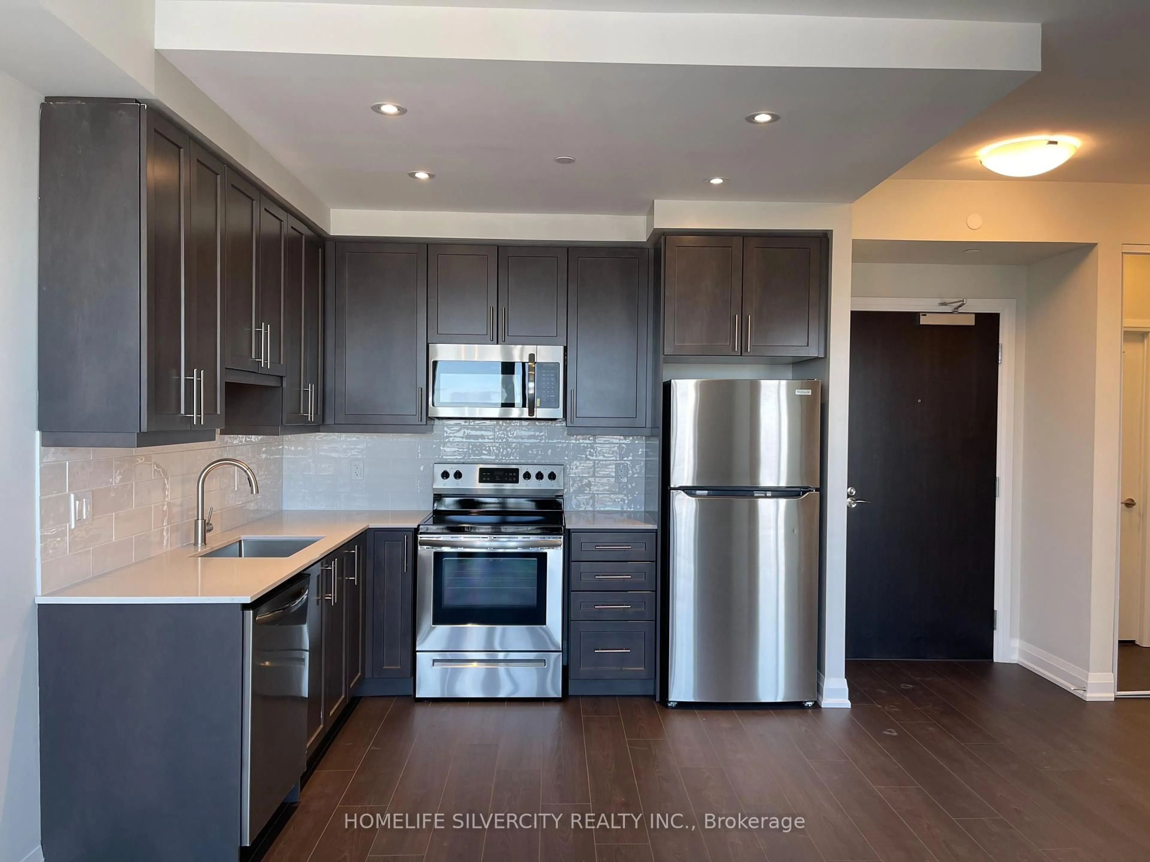 Standard kitchen, wood/laminate floor for 15 Lynch St #2104, Brampton Ontario L6W 2Z8