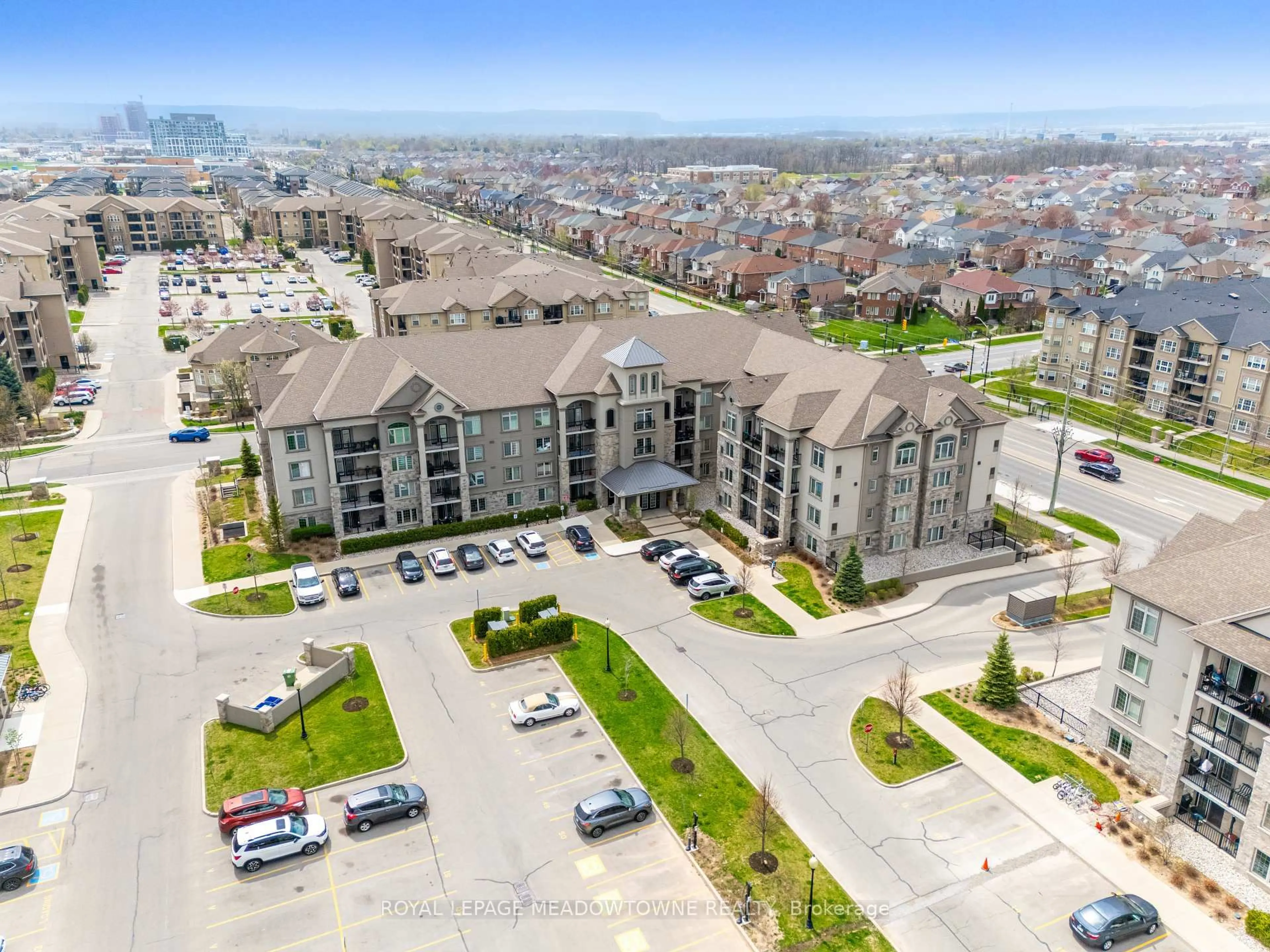 A pic from outside/outdoor area/front of a property/back of a property/a pic from drone, city buildings view from balcony for 1440 Main St #415, Milton Ontario L9T 8W3