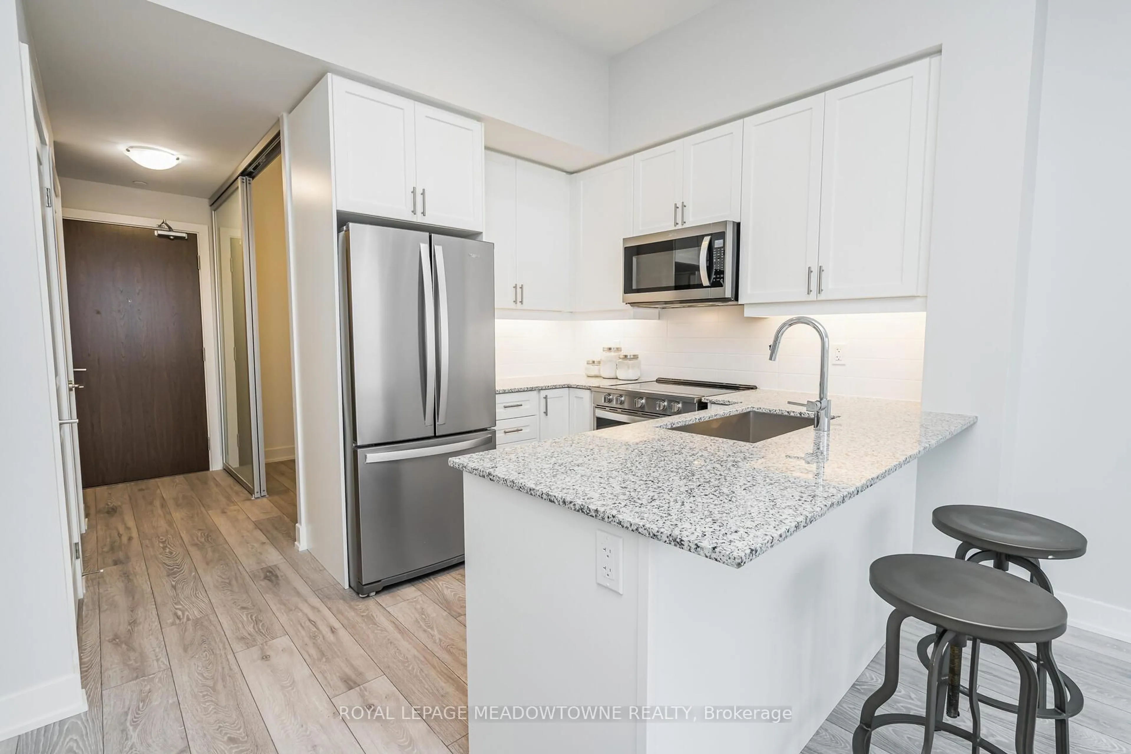 Open concept kitchen, unknown for 1050 Main St #617, Milton Ontario L9T 9M3
