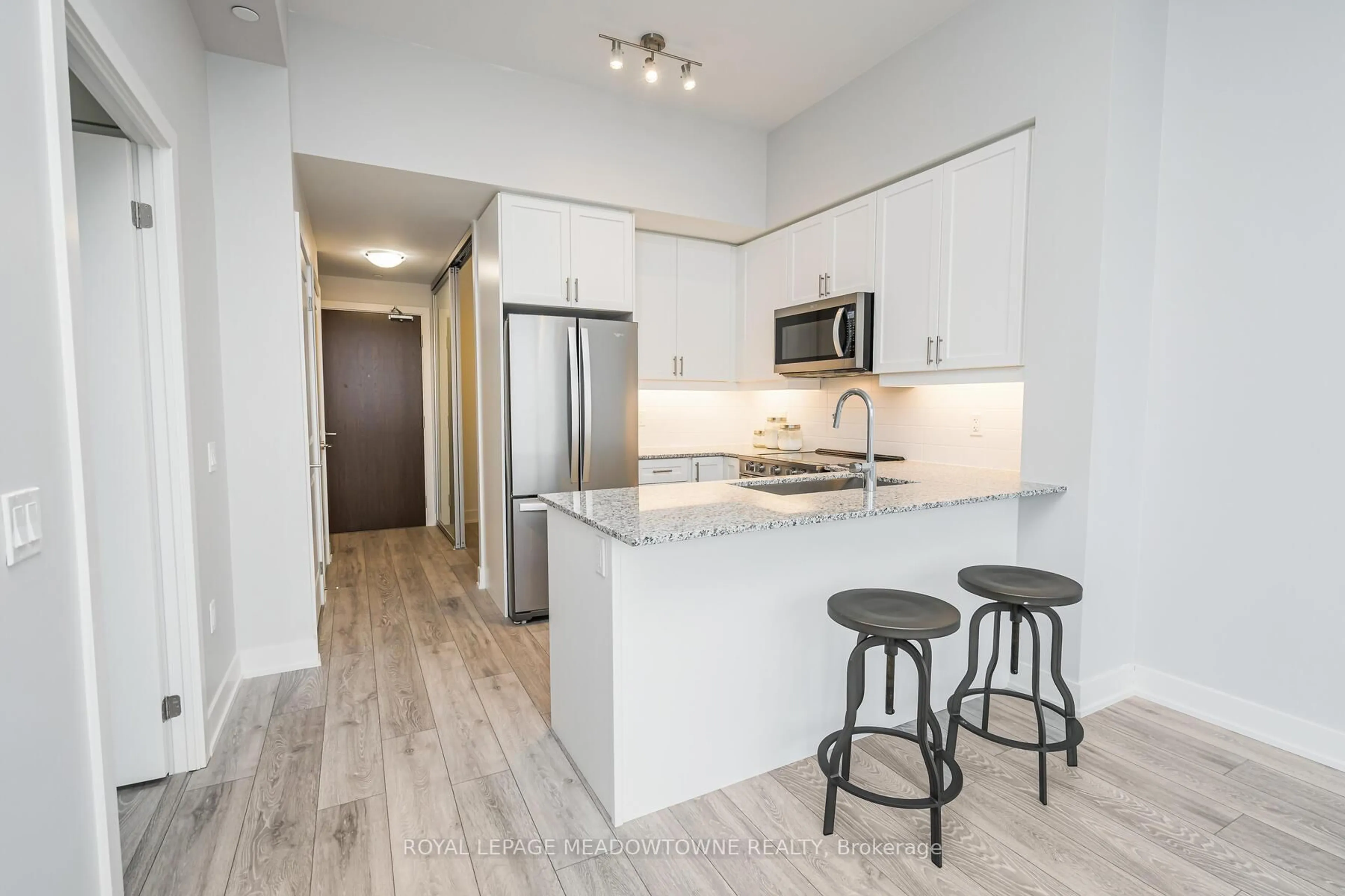 Open concept kitchen, unknown for 1050 Main St #617, Milton Ontario L9T 9M3