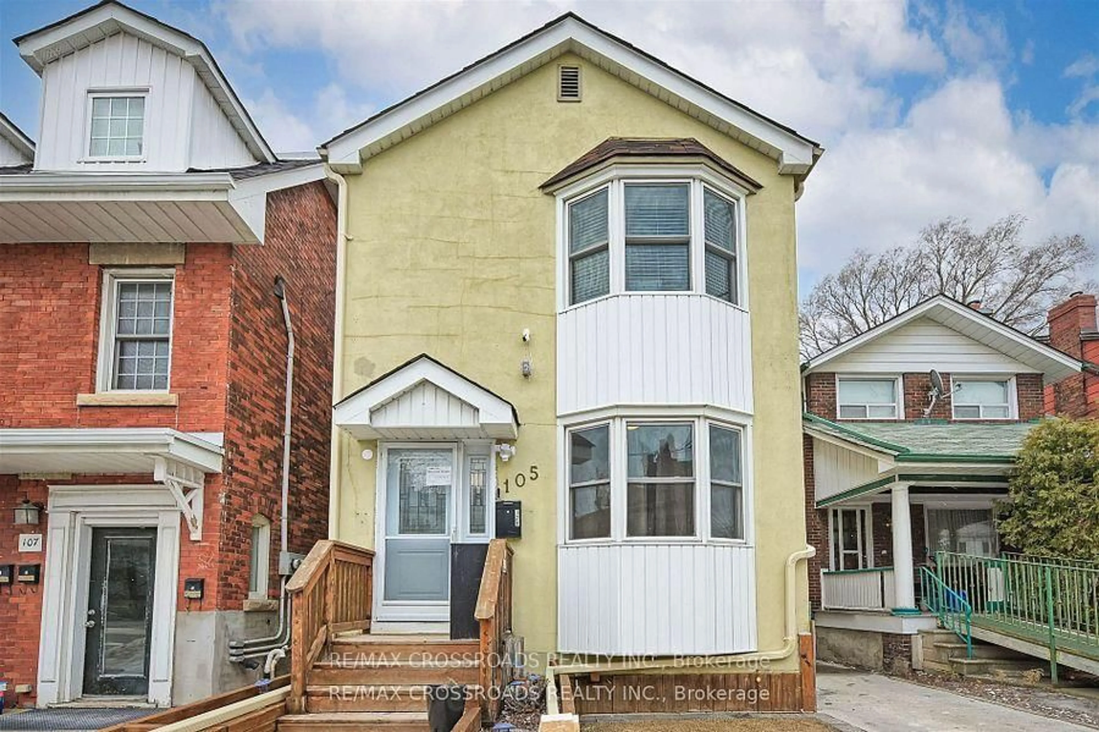 Home with brick exterior material, street for 105 Runnymede Rd, Toronto Ontario M6S 2Y4
