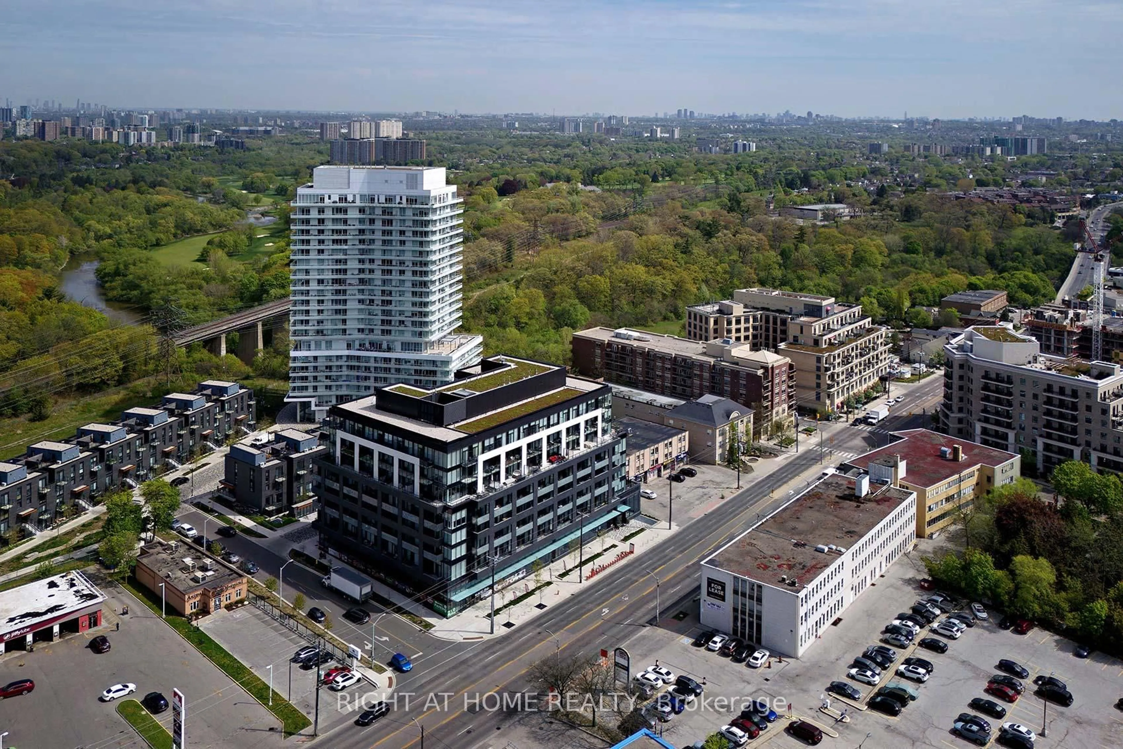 A pic from outside/outdoor area/front of a property/back of a property/a pic from drone, building for 4208 Dundas St #523, Toronto Ontario M8X 0B1