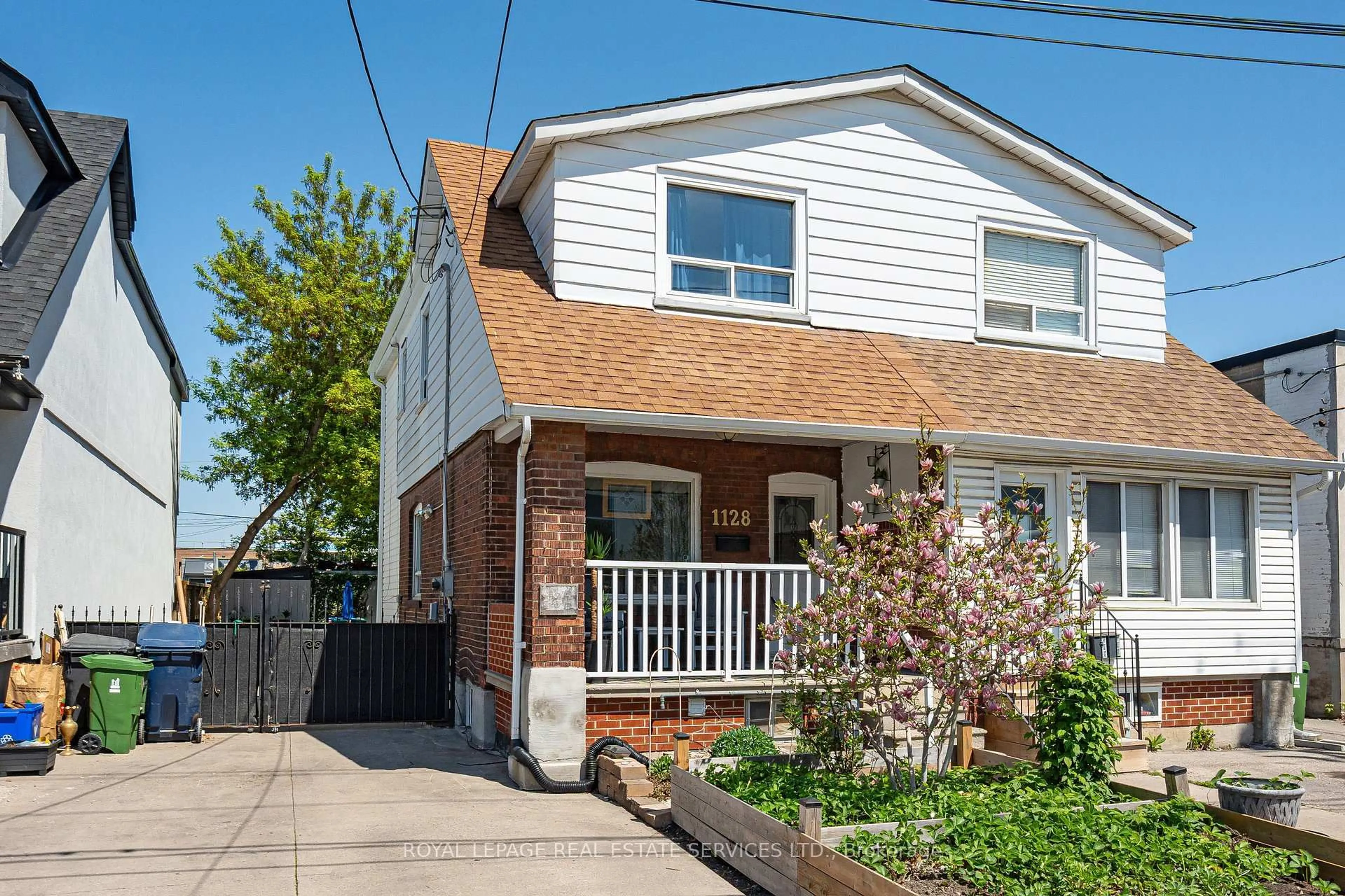 Home with brick exterior material, street for 1128 Roselawn Ave, Toronto Ontario M6B 1C4