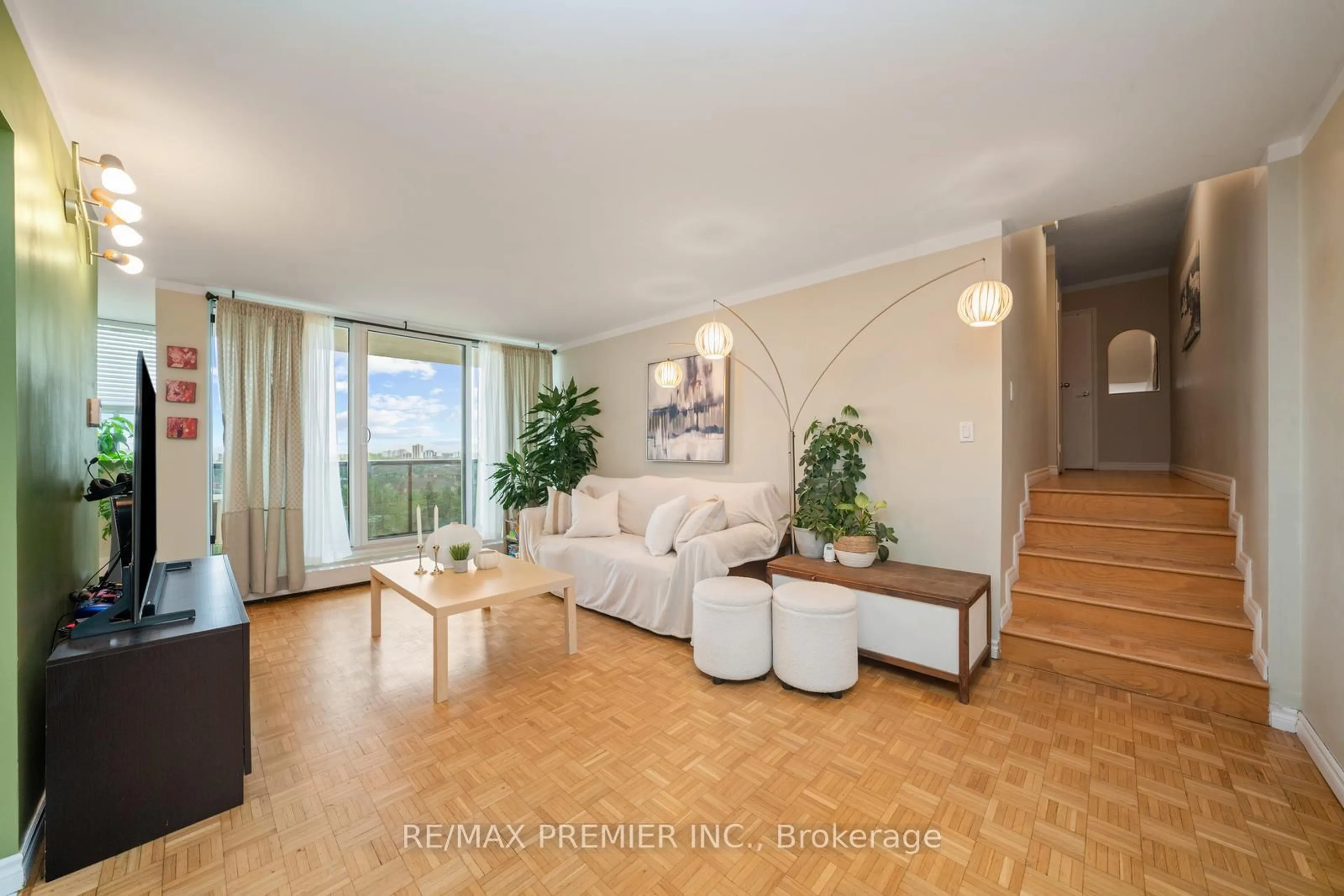 Living room with furniture, wood/laminate floor for 530 Lolita Gdns #808, Mississauga Ontario L5A 3T2