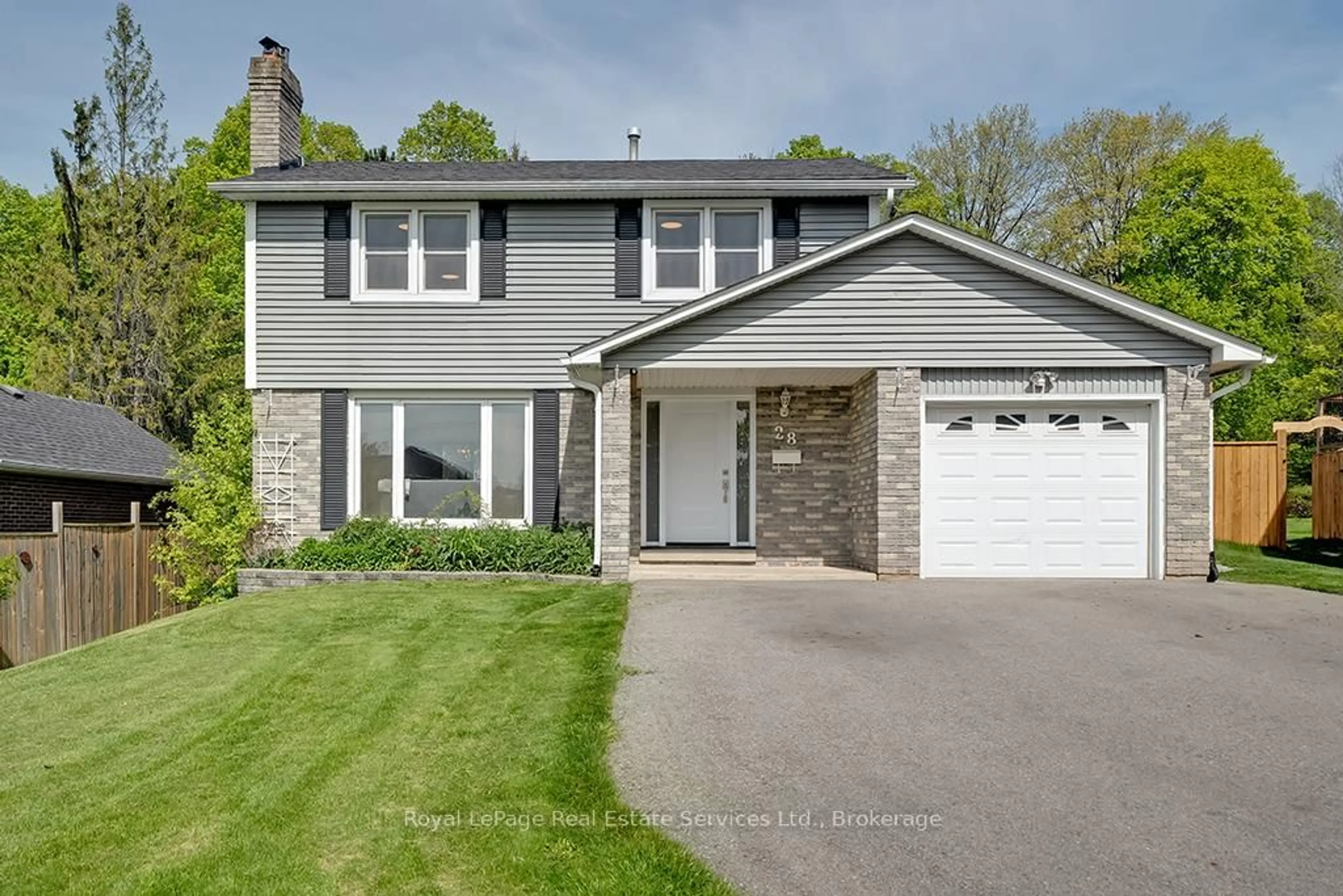 Home with vinyl exterior material, street for 28 Ann St, Halton Hills Ontario L7G 2V2