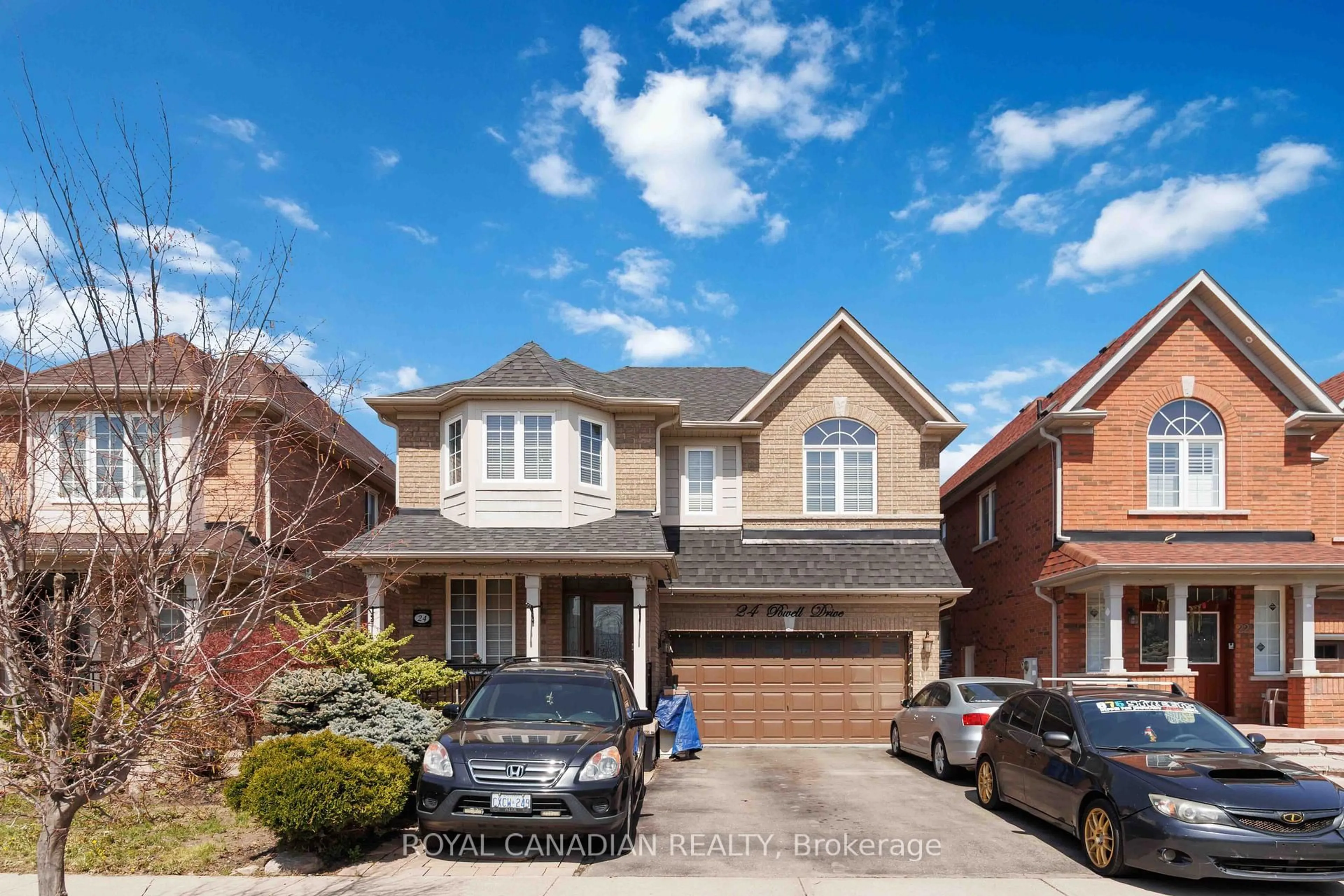 Home with brick exterior material, street for 24 Powell Dr, Brampton Ontario L6R 0L1