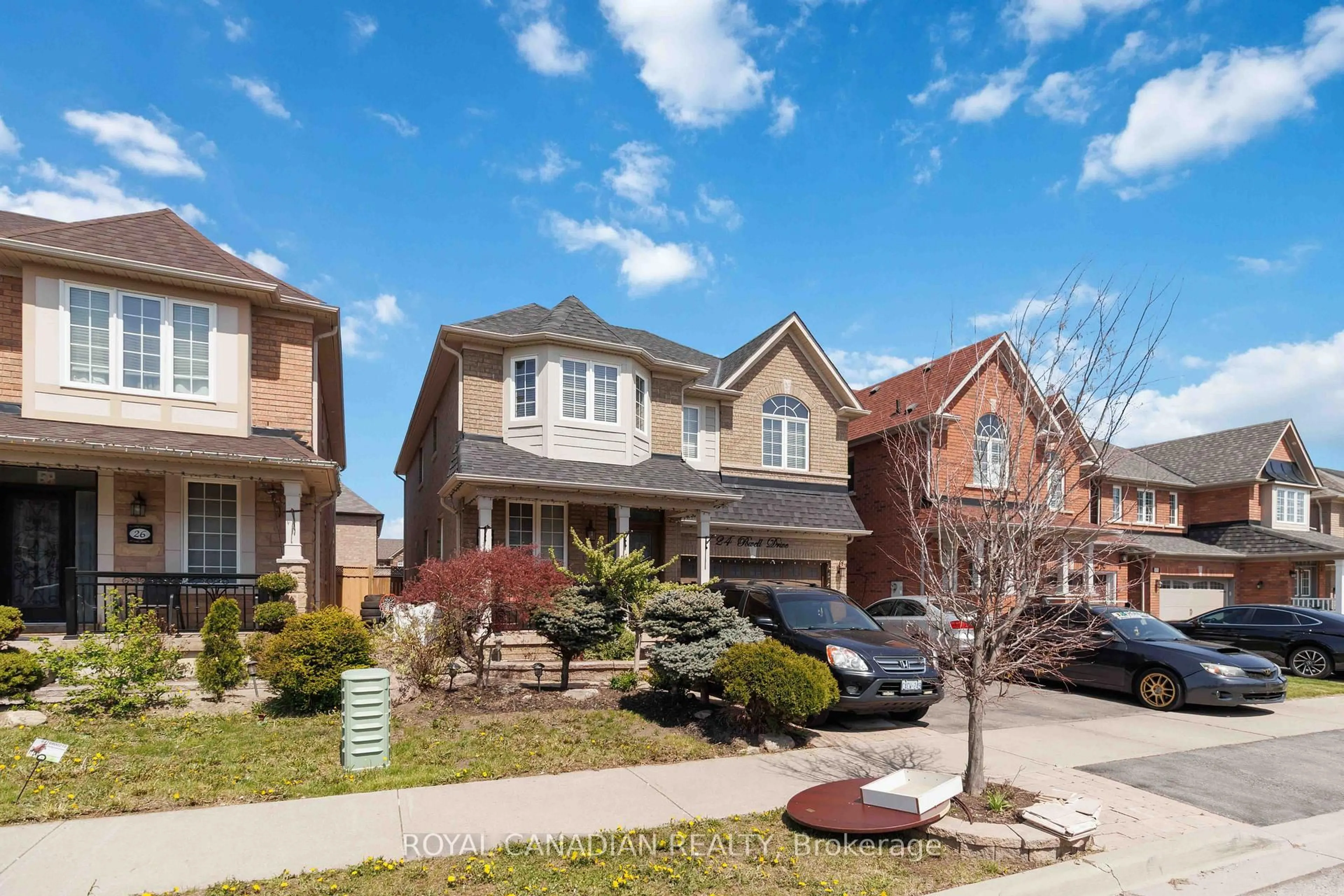 Home with brick exterior material, street for 24 Powell Dr, Brampton Ontario L6R 0L1