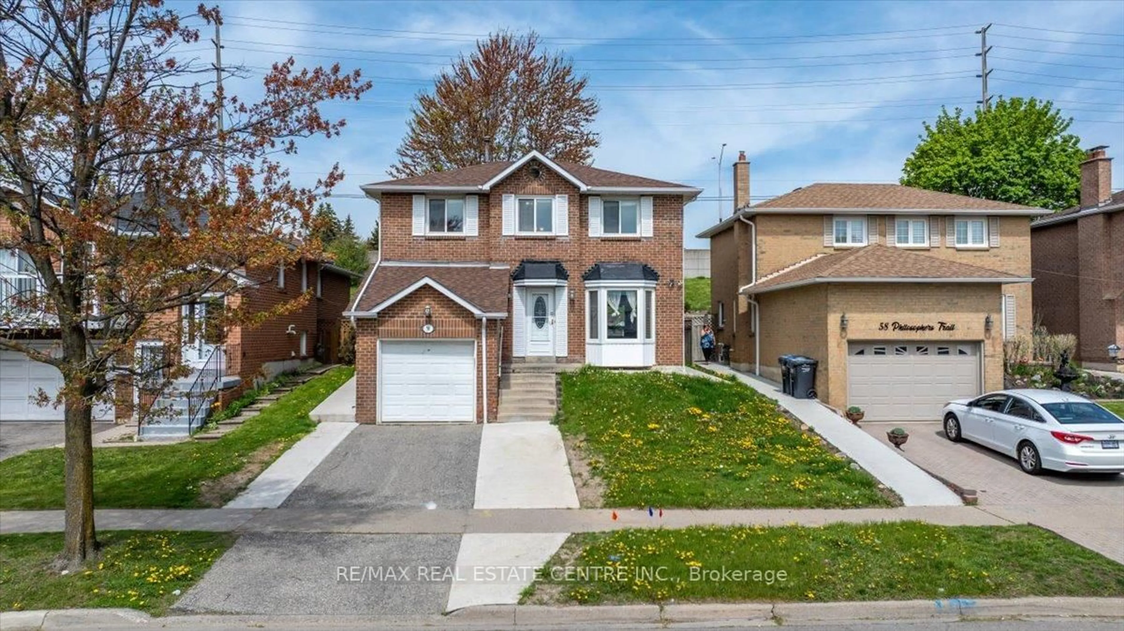 Home with brick exterior material, street for 56 Philosophers Tr, Brampton Ontario L6S 4C9