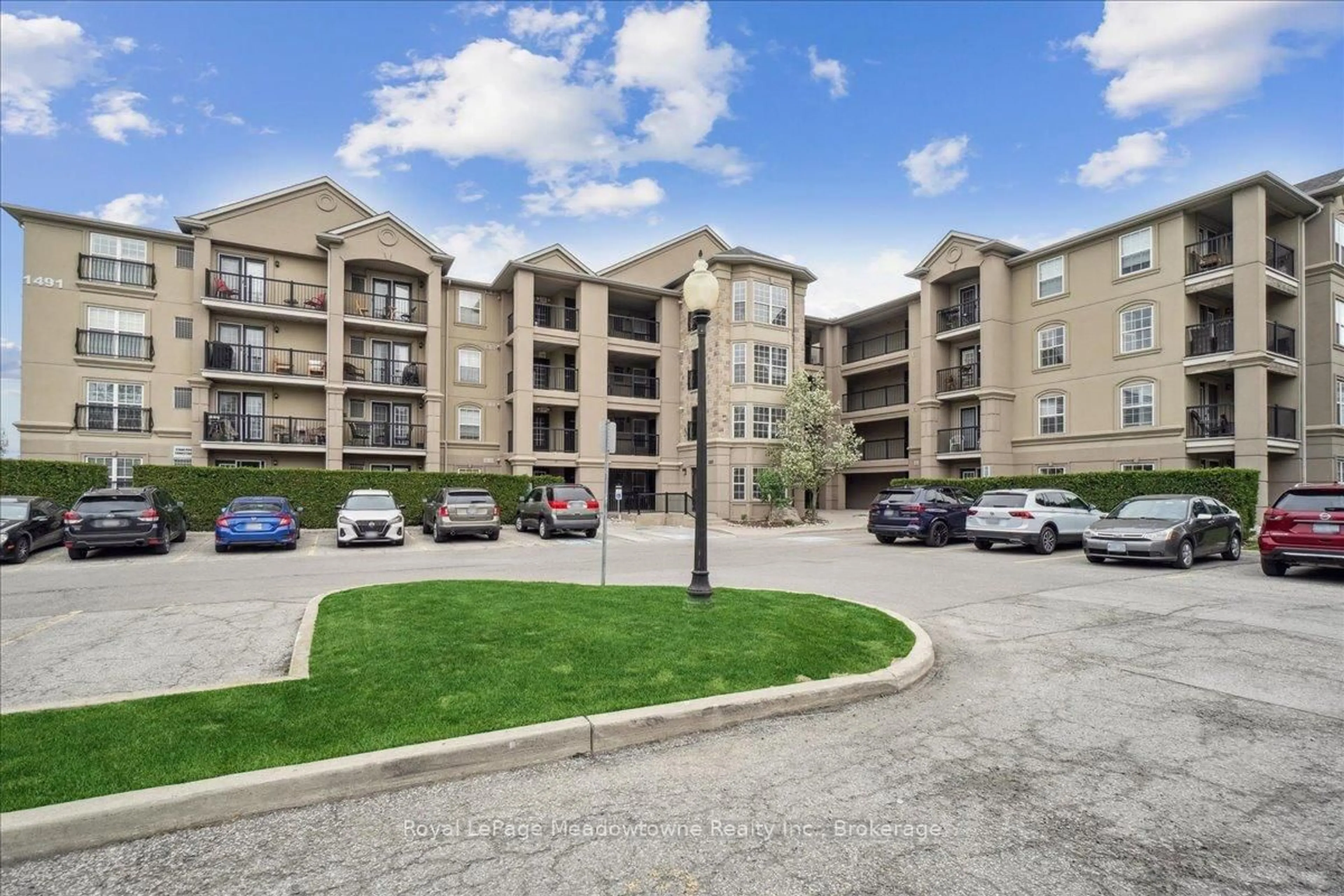 A pic from outside/outdoor area/front of a property/back of a property/a pic from drone, unknown for 1491 Maple Ave #411, Milton Ontario L9T 0B8