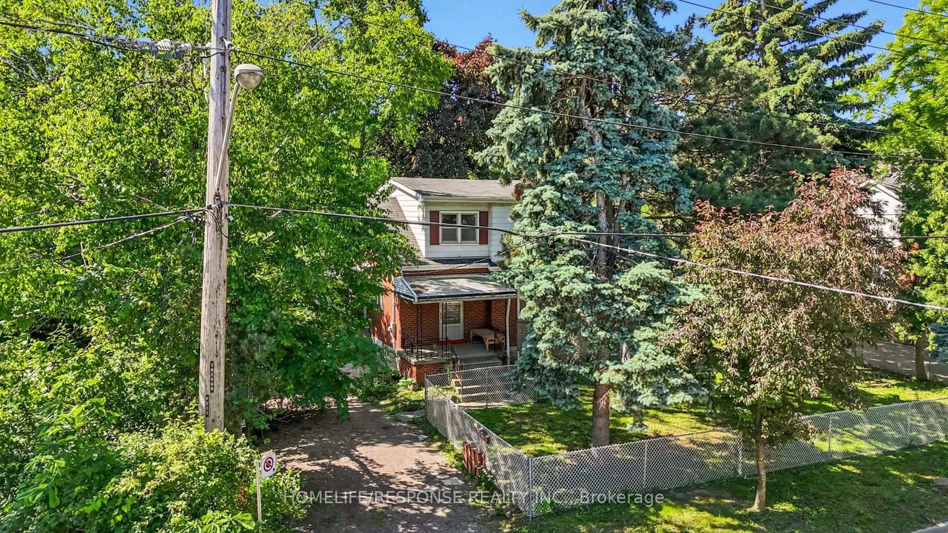 A pic from outside/outdoor area/front of a property/back of a property/a pic from drone, street for 211 Bering Ave, Toronto Ontario M8Z 3A4