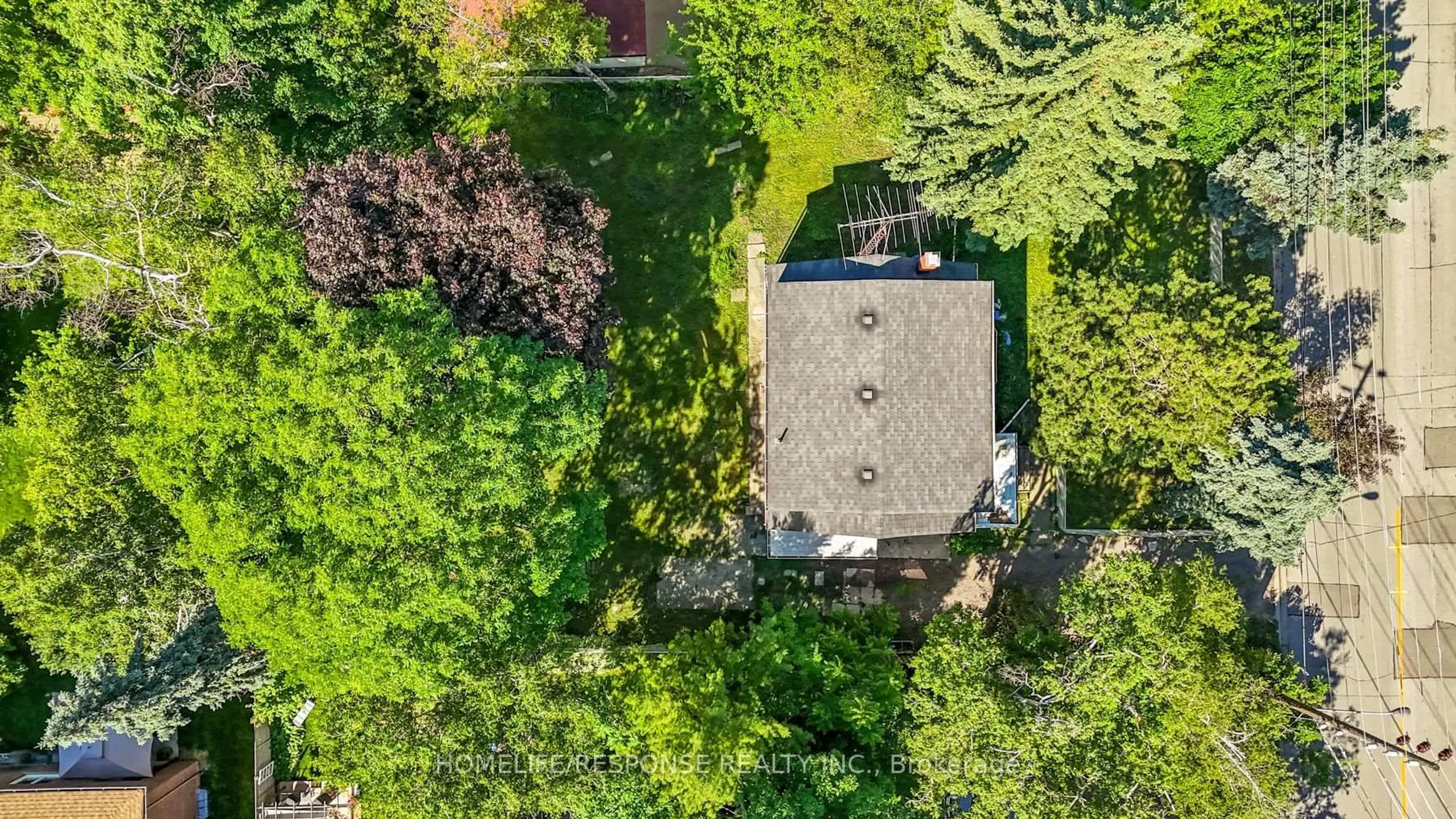 A pic from outside/outdoor area/front of a property/back of a property/a pic from drone, unknown for 211 Bering Ave, Toronto Ontario M8Z 3A4