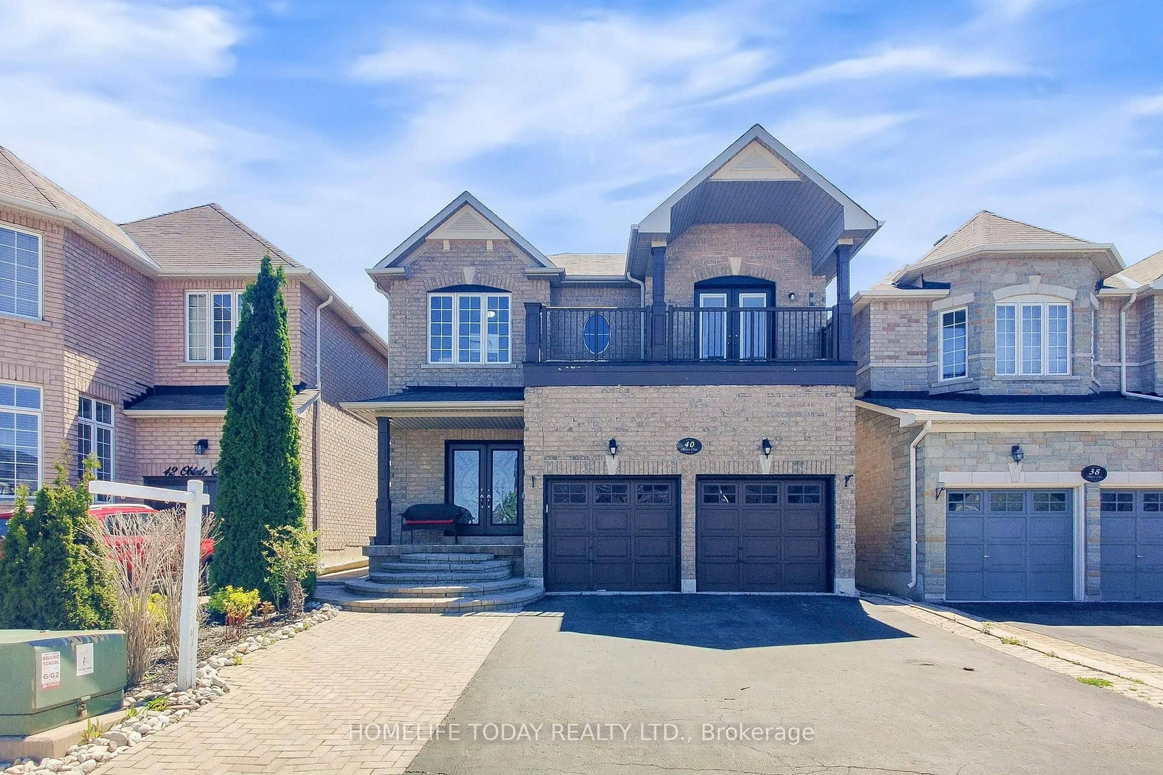 Home with brick exterior material, street for 40 Oblate Cres, Brampton Ontario L6Y 0L3