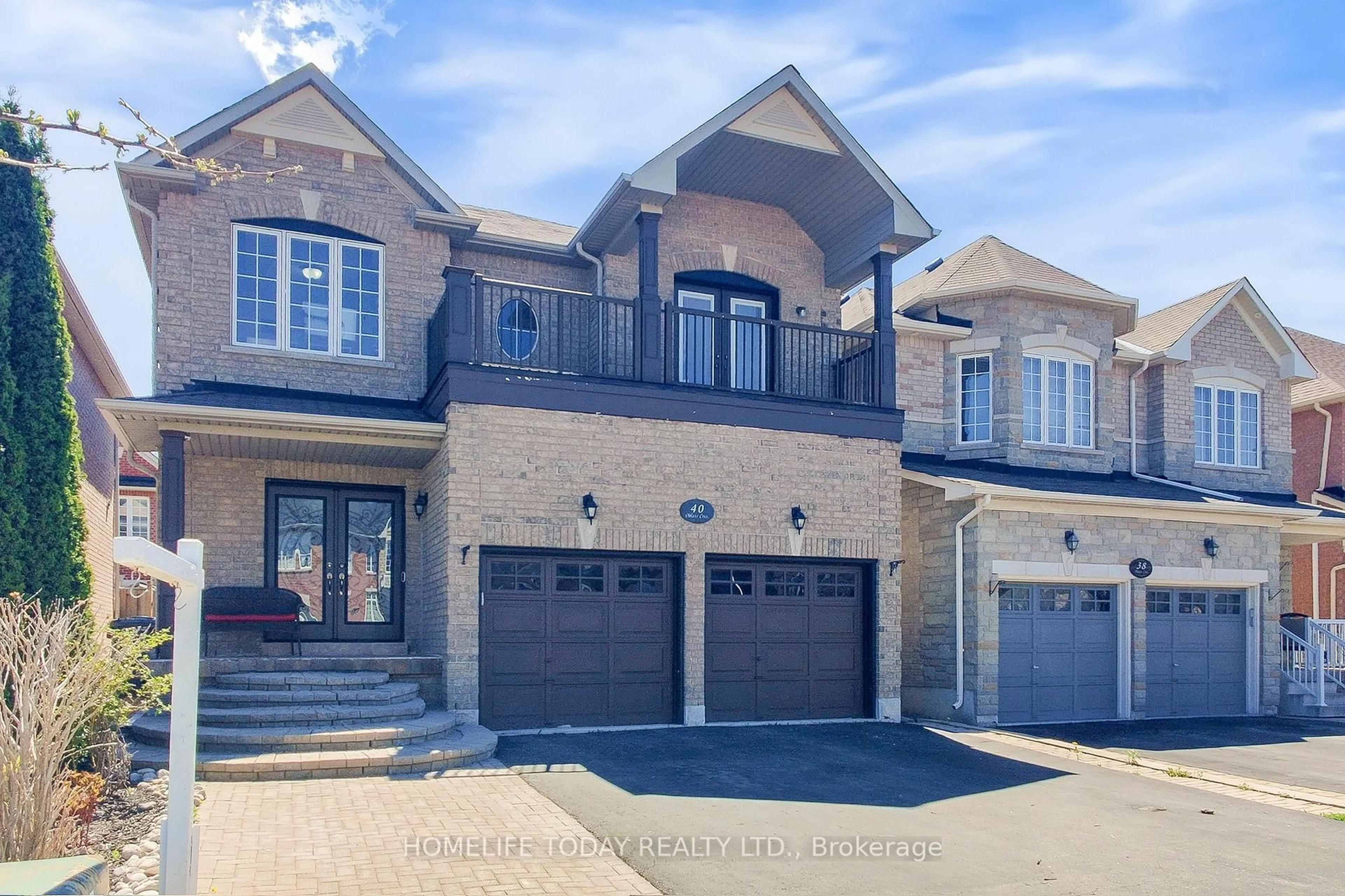 Home with brick exterior material, street for 40 Oblate Cres, Brampton Ontario L6Y 0L3