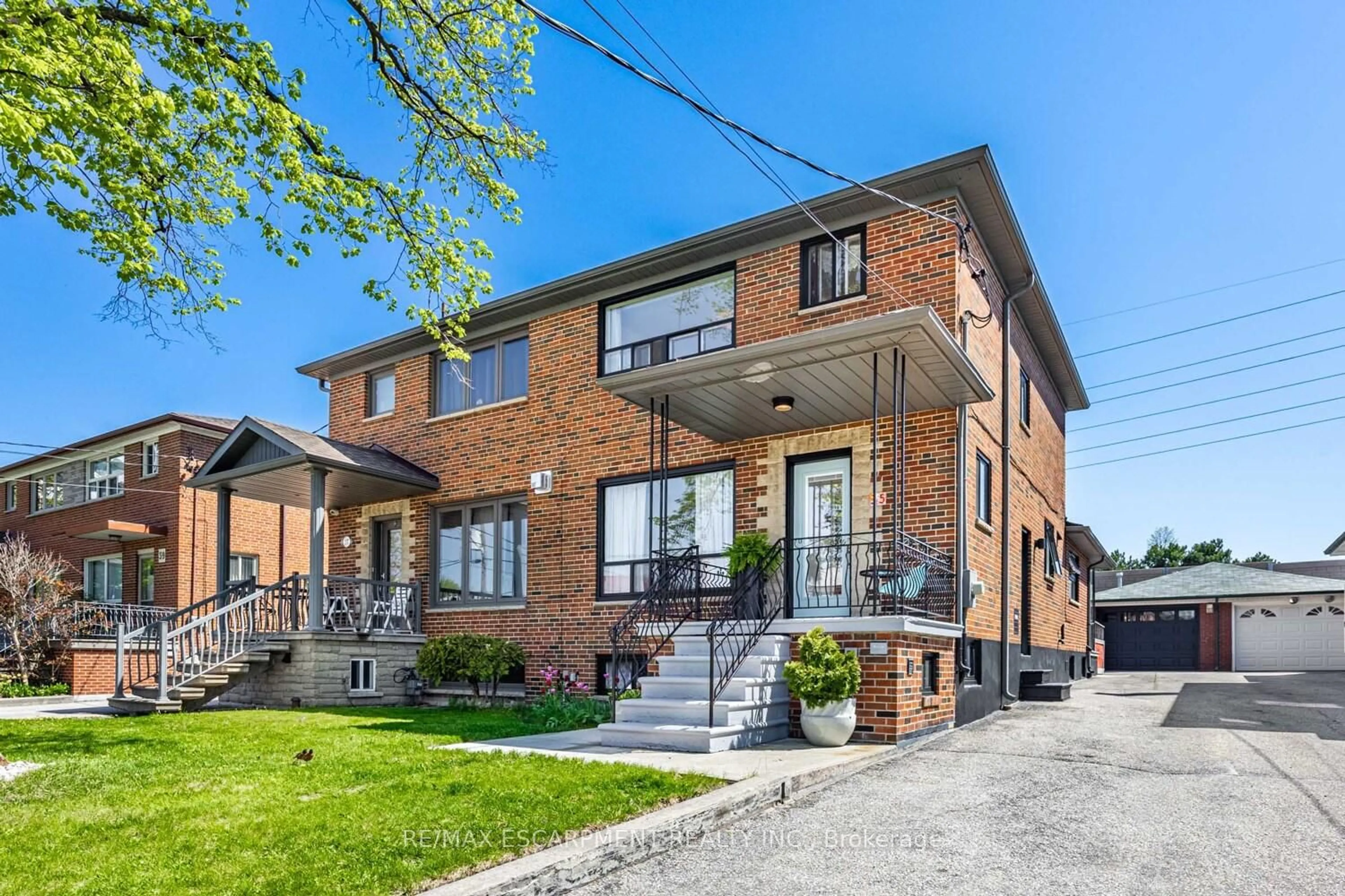 Home with brick exterior material, street for 35 Woodenhill Crt, Toronto Ontario M6M 1K6