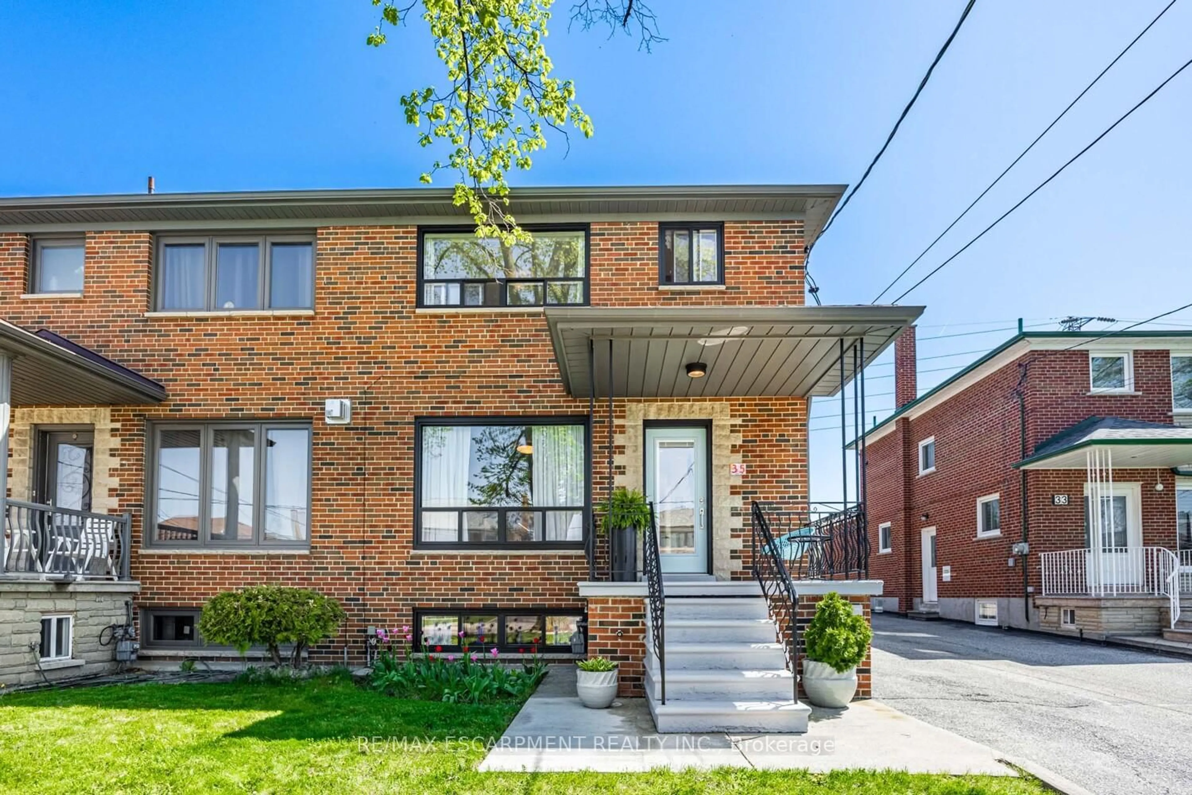 Home with brick exterior material, street for 35 Woodenhill Crt, Toronto Ontario M6M 1K6