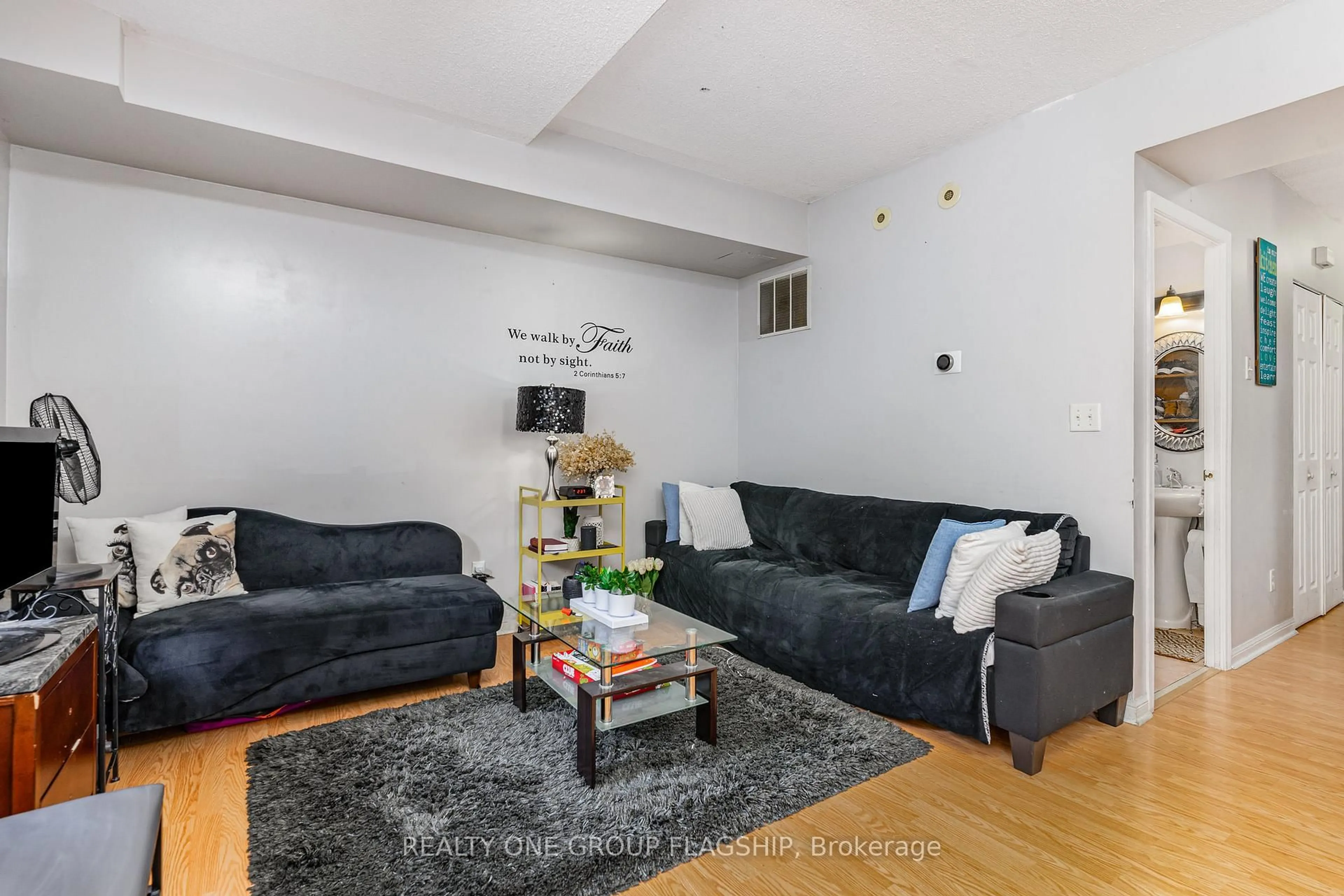 Living room with furniture, unknown for 3045 Finch Ave #1032, Toronto Ontario M9M 0A5