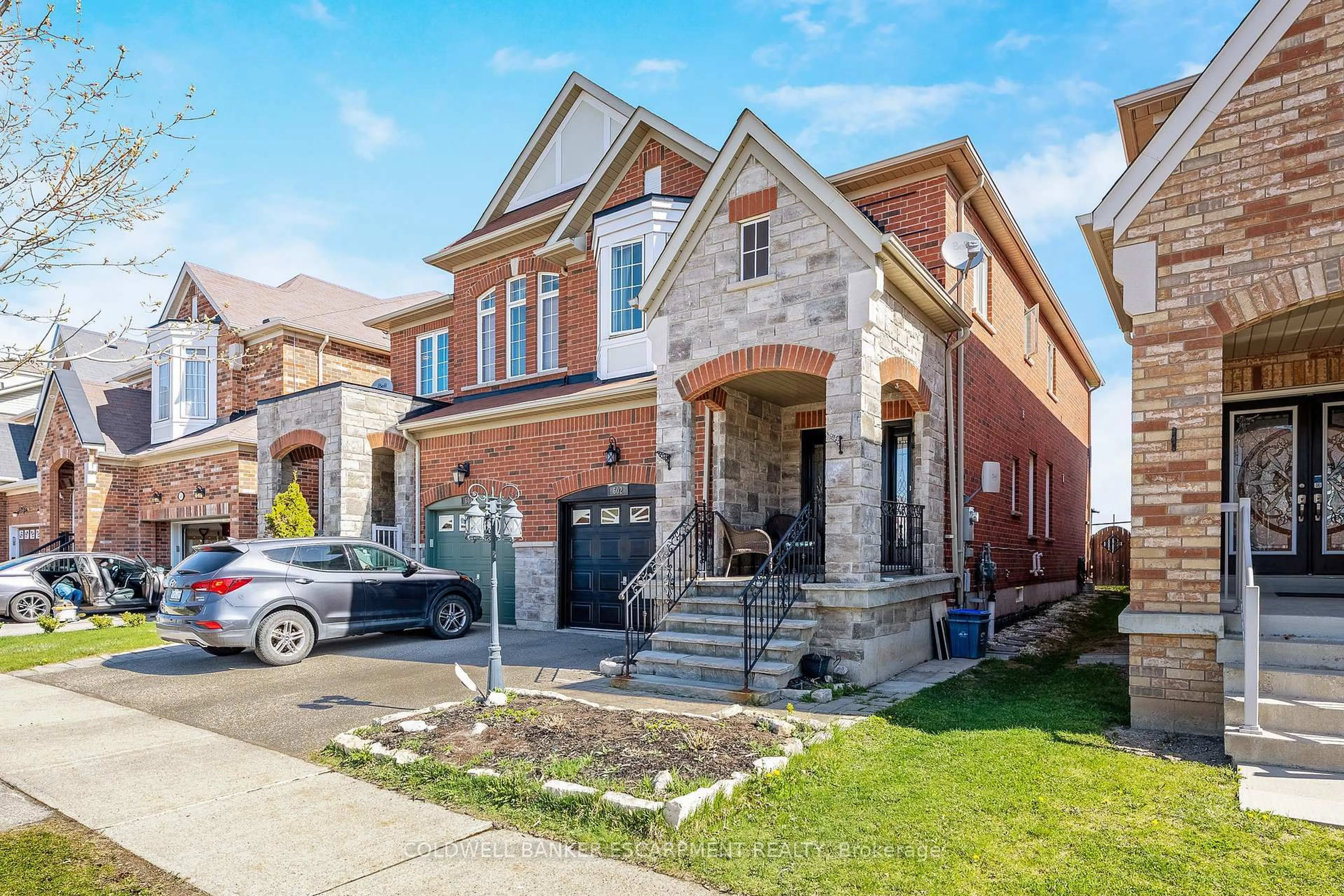 Home with brick exterior material, street for 602 Yates Dr, Milton Ontario L9T 7R1