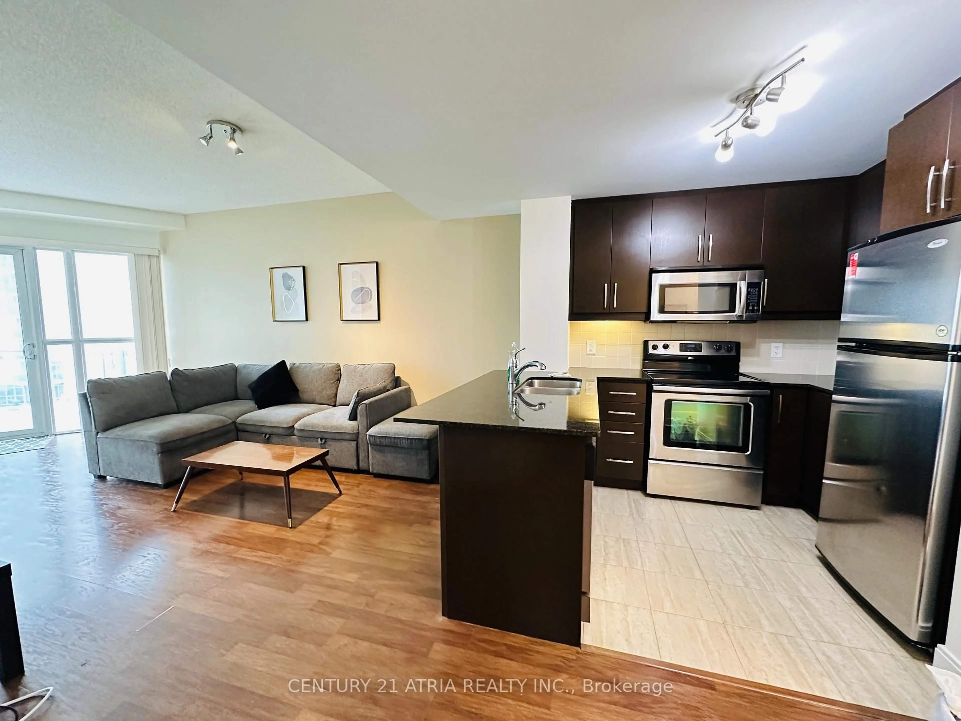 Open concept kitchen, wood/laminate floor for 50 Absolute Ave #504, Mississauga Ontario L4Z 0A9