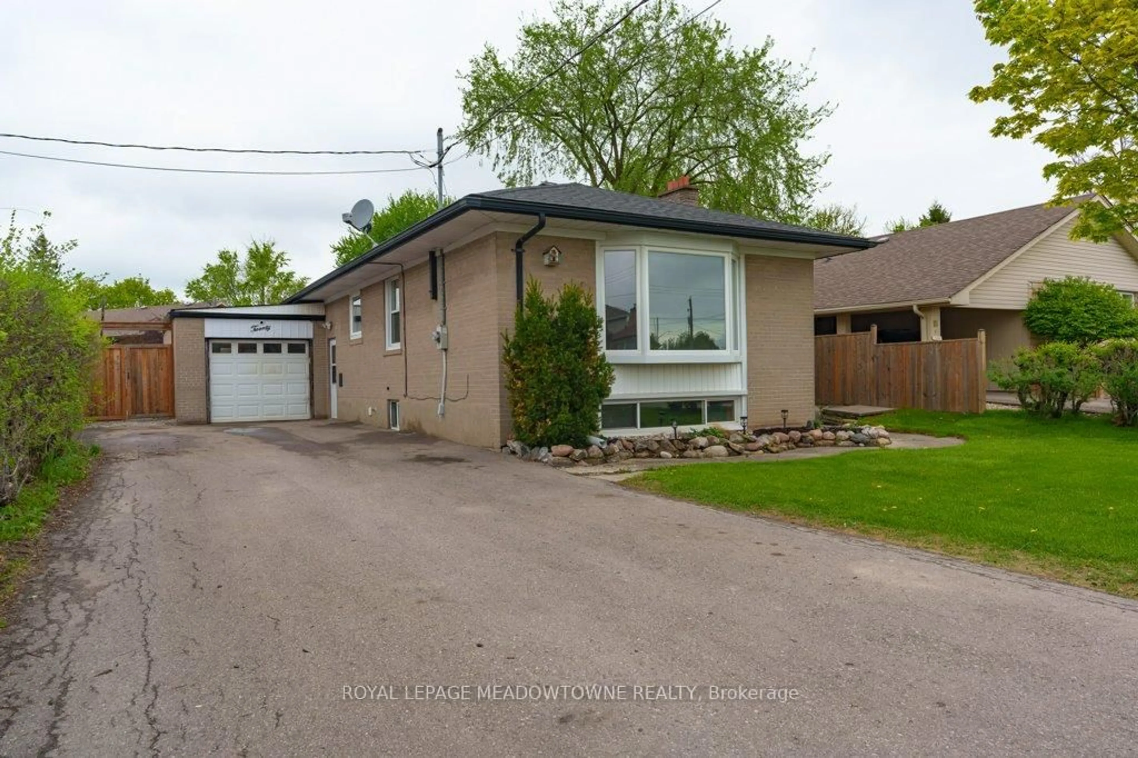 Home with brick exterior material, street for 20 Bairstow Cres, Halton Hills Ontario L7G 1L8