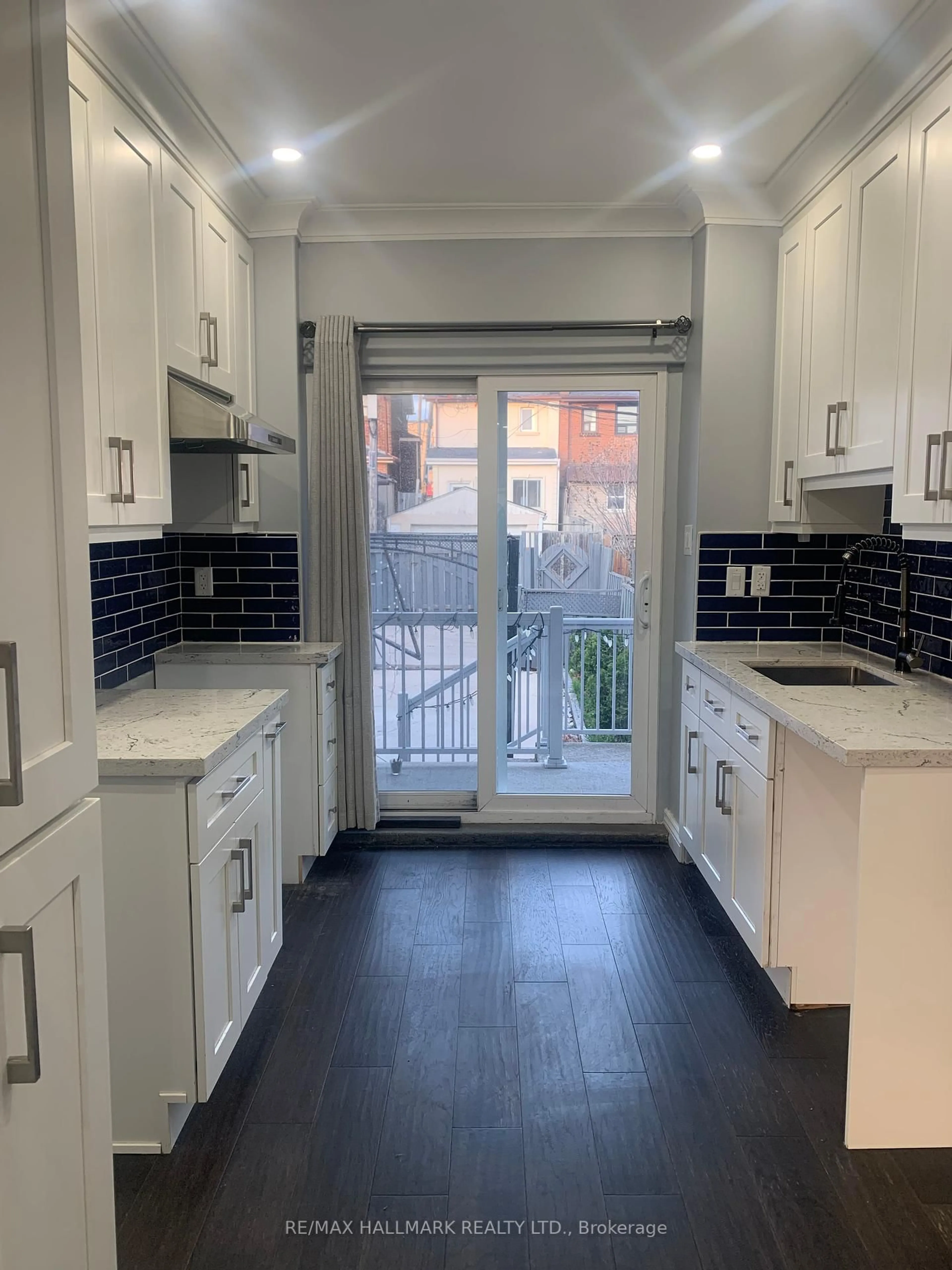 Open concept kitchen, ceramic/tile floor for 161 Sellers Ave, Toronto Ontario M6E 3V1
