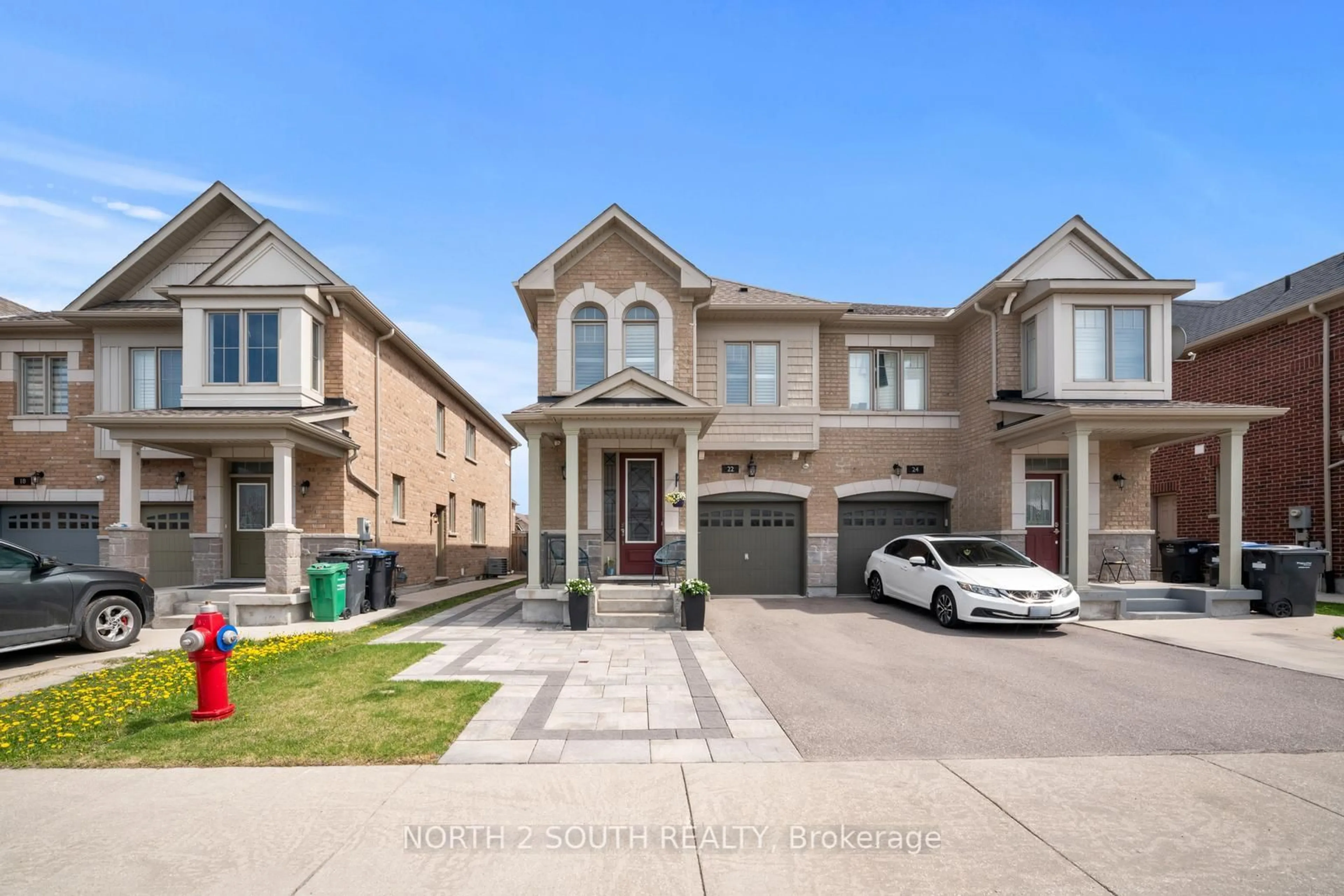 Home with brick exterior material, street for 22 Bernadino St, Brampton Ontario L6P 4G1