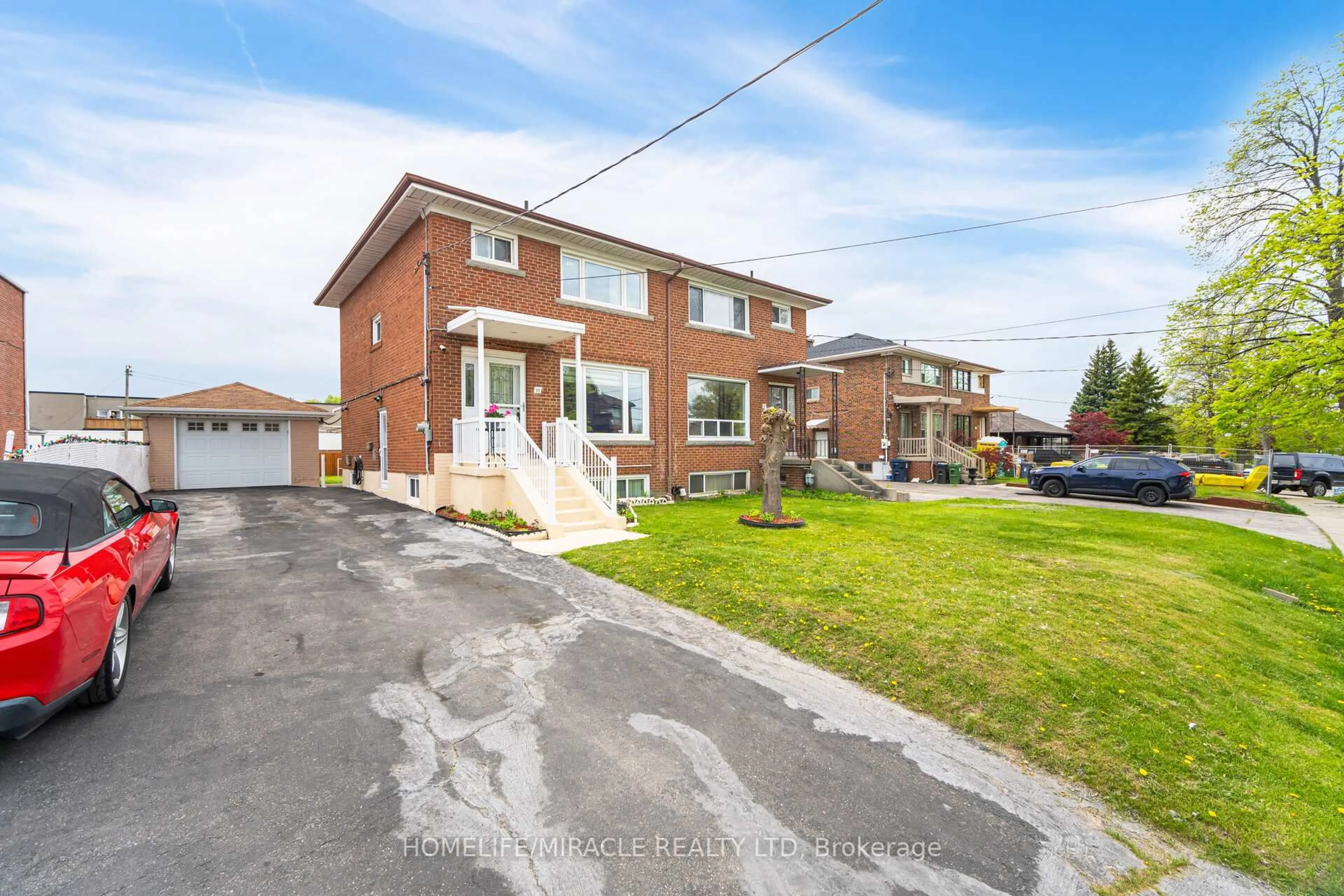 Home with brick exterior material, street for 11 Arrowsmith Ave, Toronto Ontario M6M 2W8