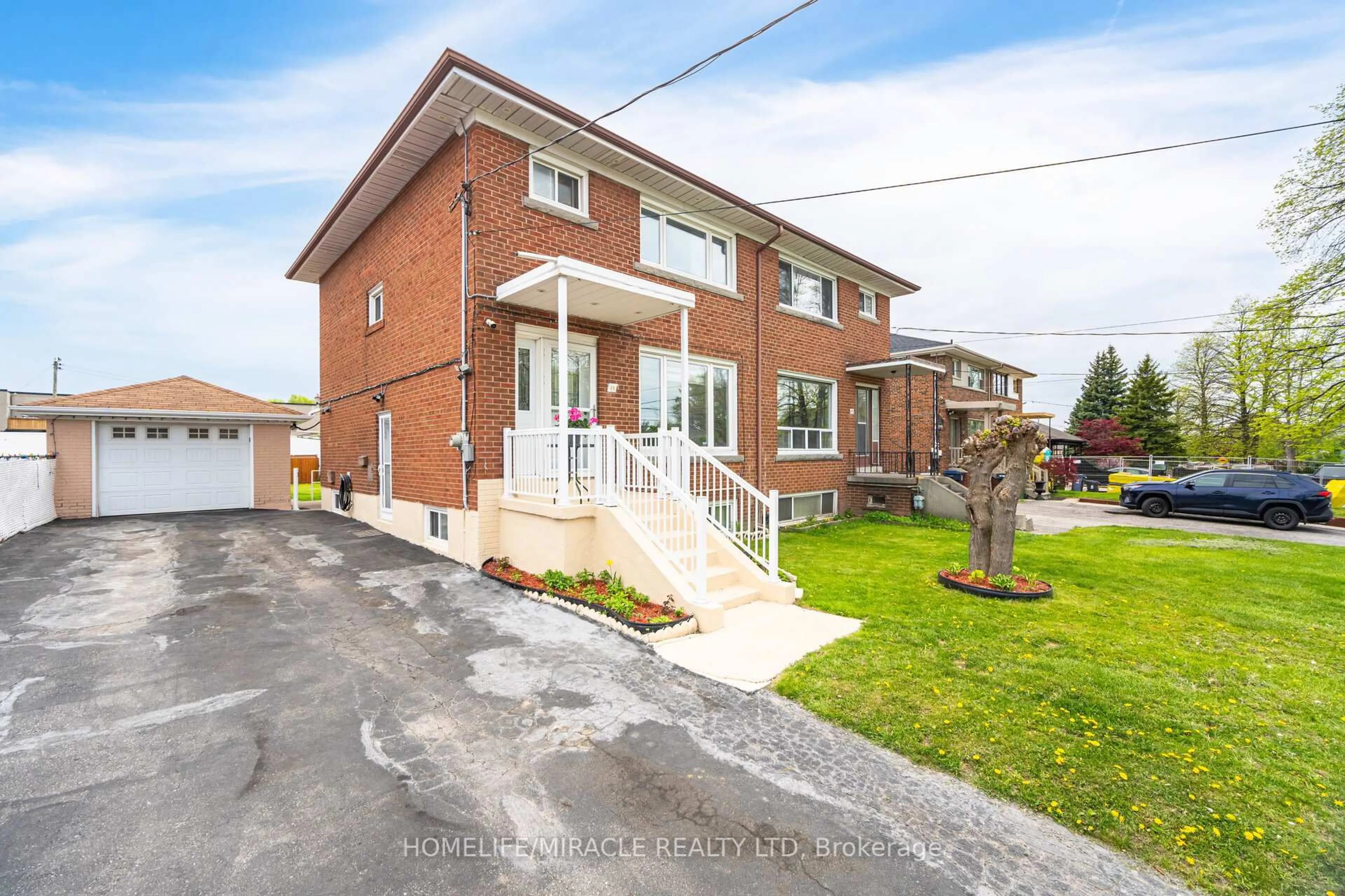 Home with brick exterior material, street for 11 Arrowsmith Ave, Toronto Ontario M6M 2W8