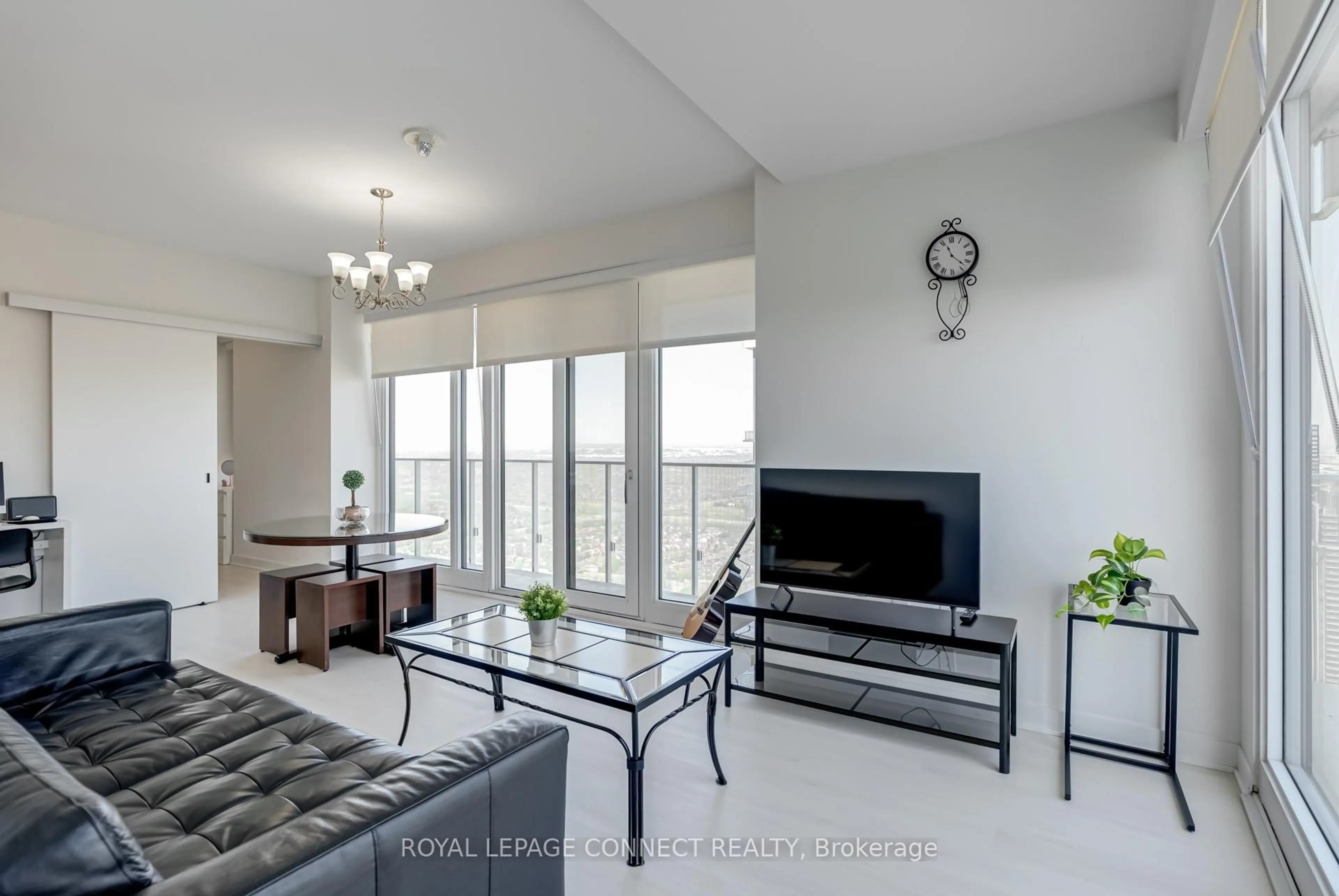 Living room with furniture, unknown for 3900 Confederation Pkwy #4710, Mississauga Ontario L5B 0M3