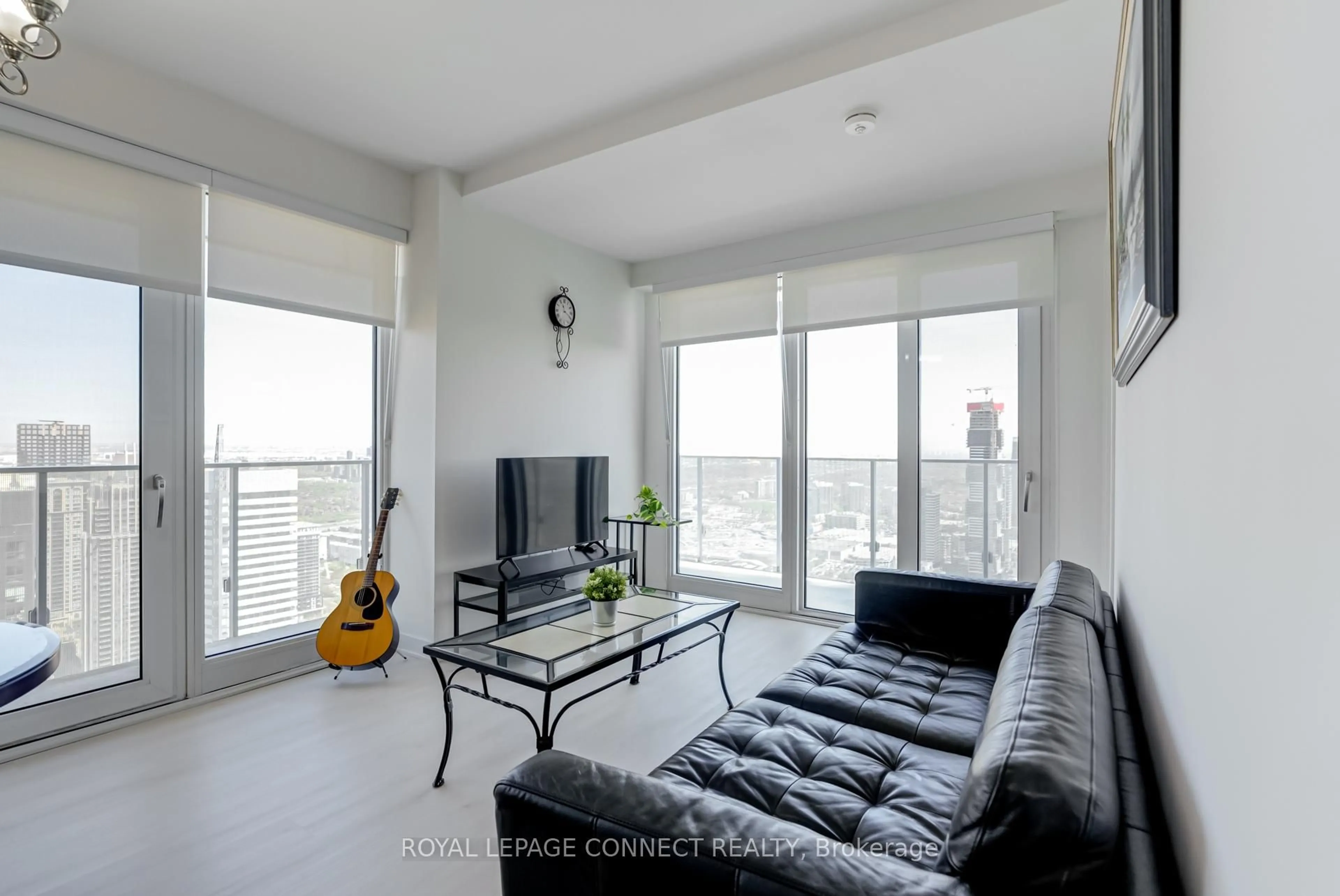Living room with furniture, unknown for 3900 Confederation Pkwy #4710, Mississauga Ontario L5B 0M3