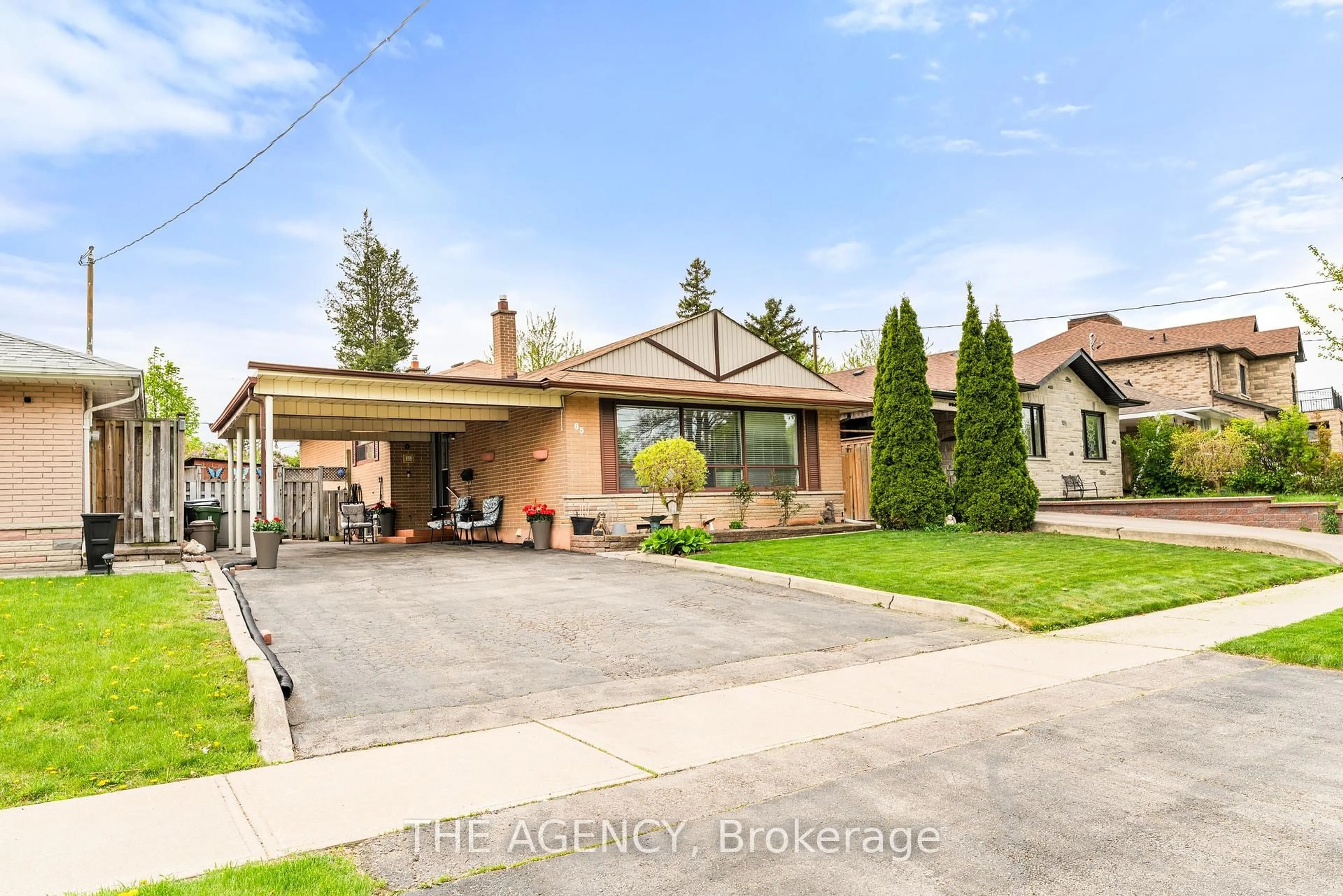 A pic from outside/outdoor area/front of a property/back of a property/a pic from drone, street for 65 Barkwin Dr, Toronto Ontario M9V 2W5