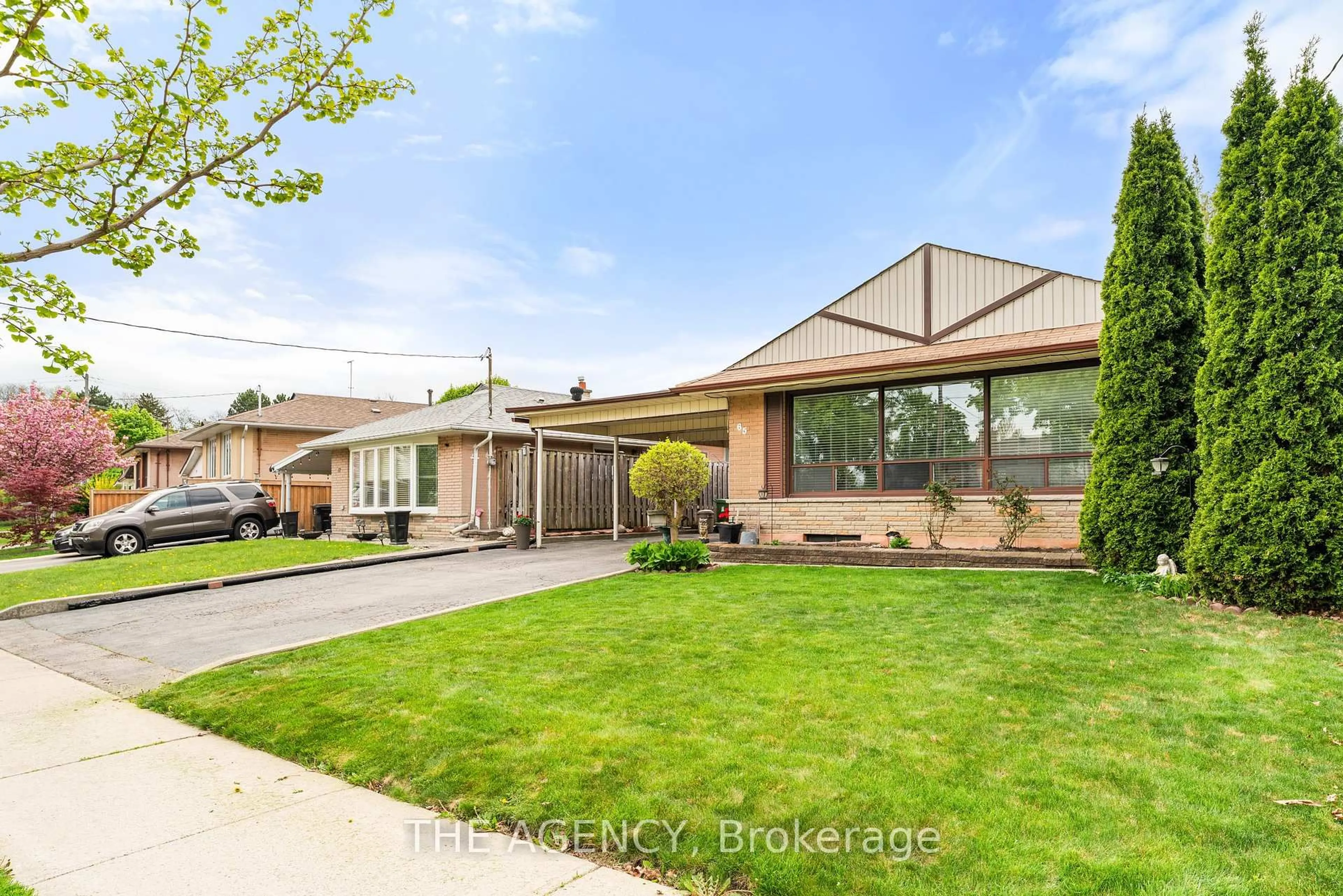 Home with brick exterior material, street for 65 Barkwin Dr, Toronto Ontario M9V 2W5