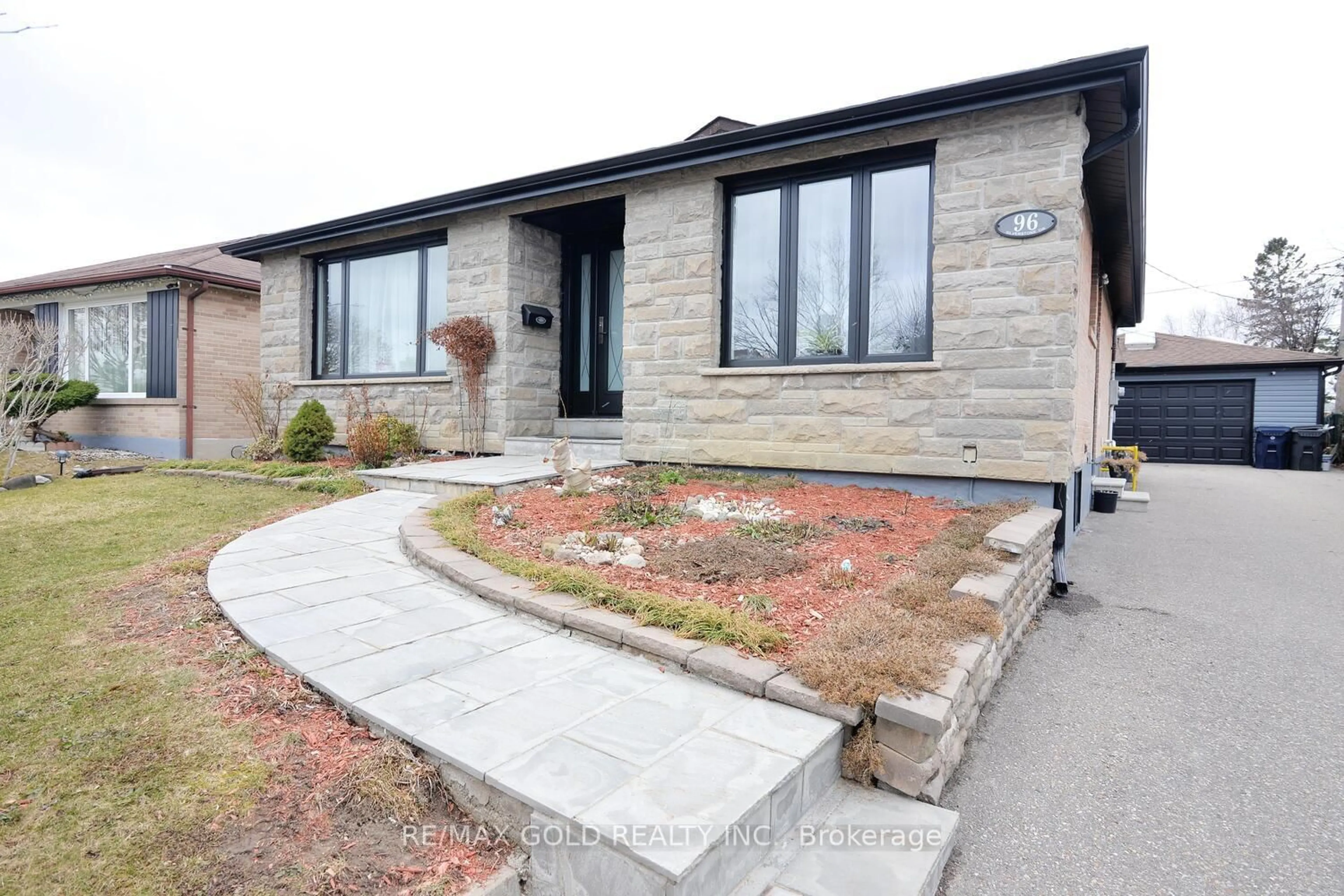 Home with brick exterior material, street for 96 Silverstone Dr, Toronto Ontario M9V 3G5
