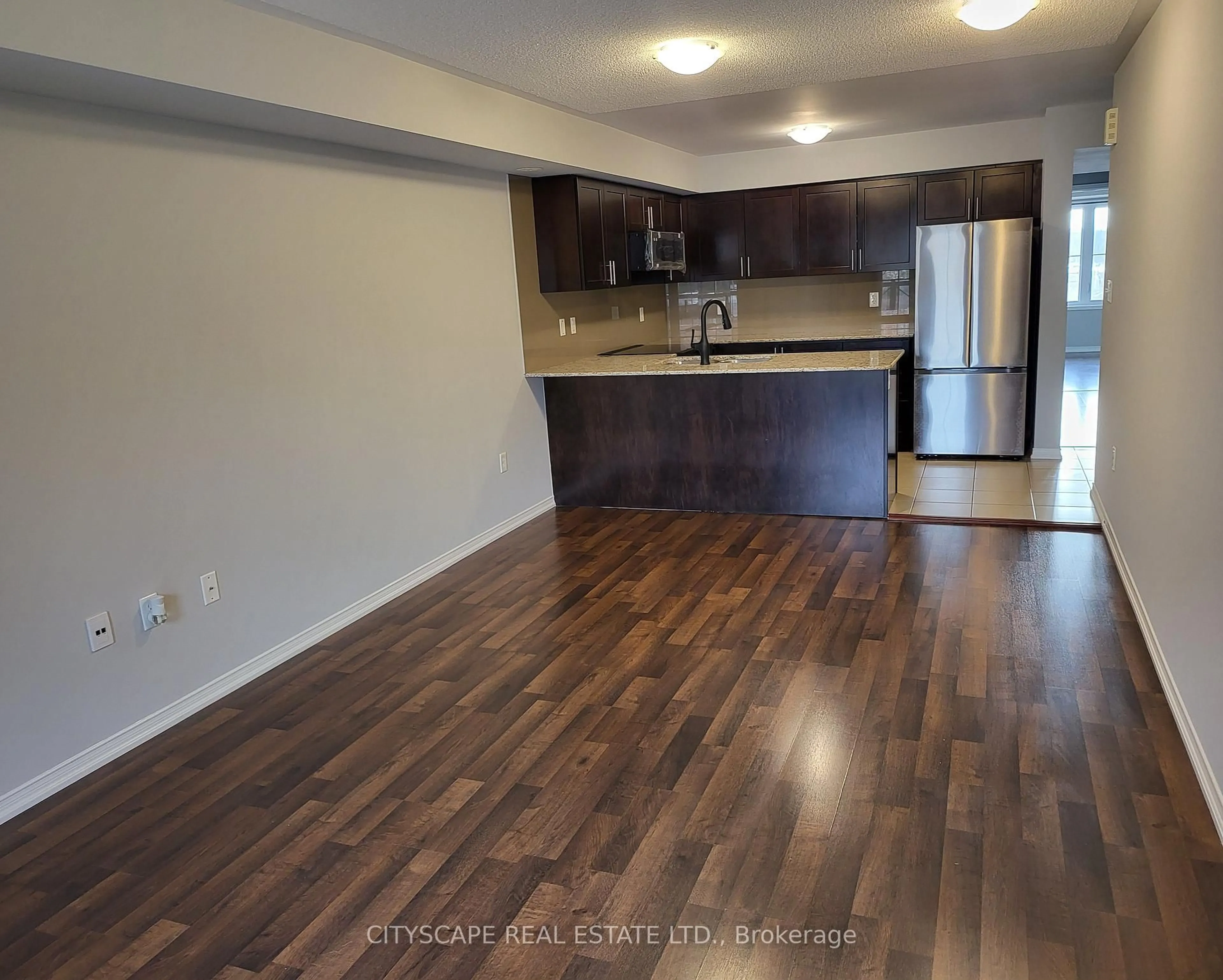 Open concept kitchen, wood/laminate floor for 2496 Post Rd #6, Oakville Ontario L6H 0K1