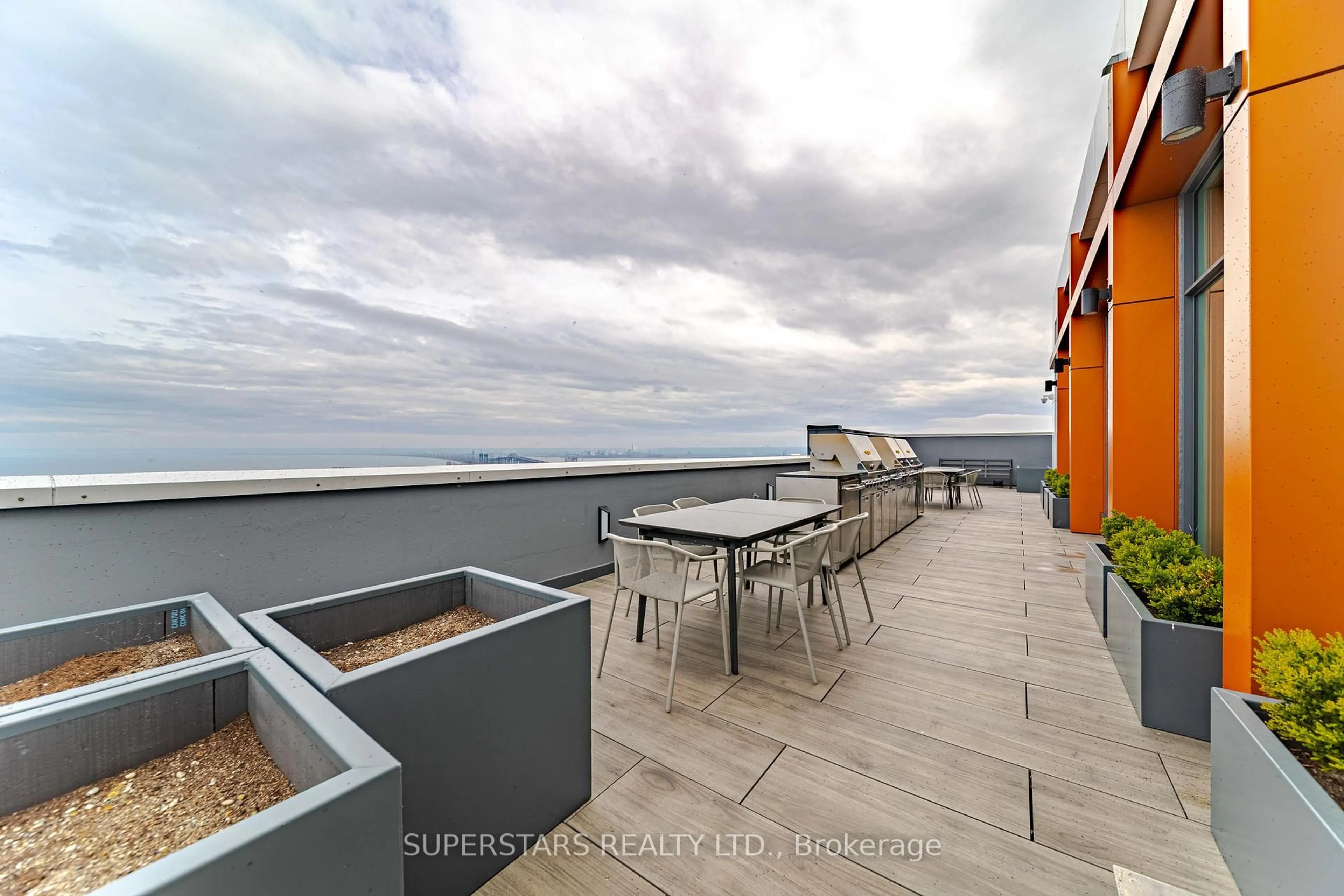 Patio, city buildings view from balcony for 500 Brock Ave #1007, Burlington Ontario L7S 0A5