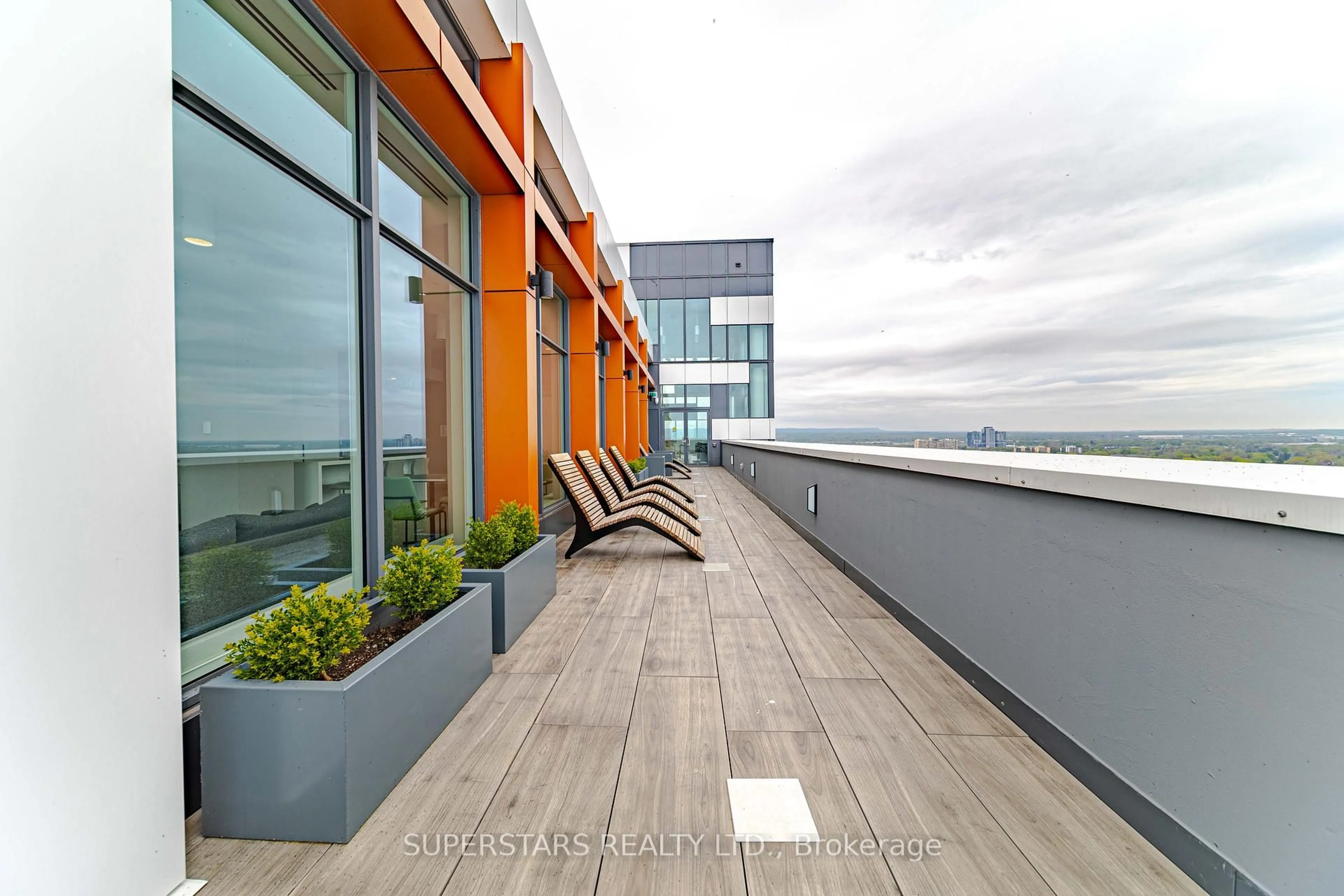 Patio, city buildings view from balcony for 500 Brock Ave #1007, Burlington Ontario L7S 0A5