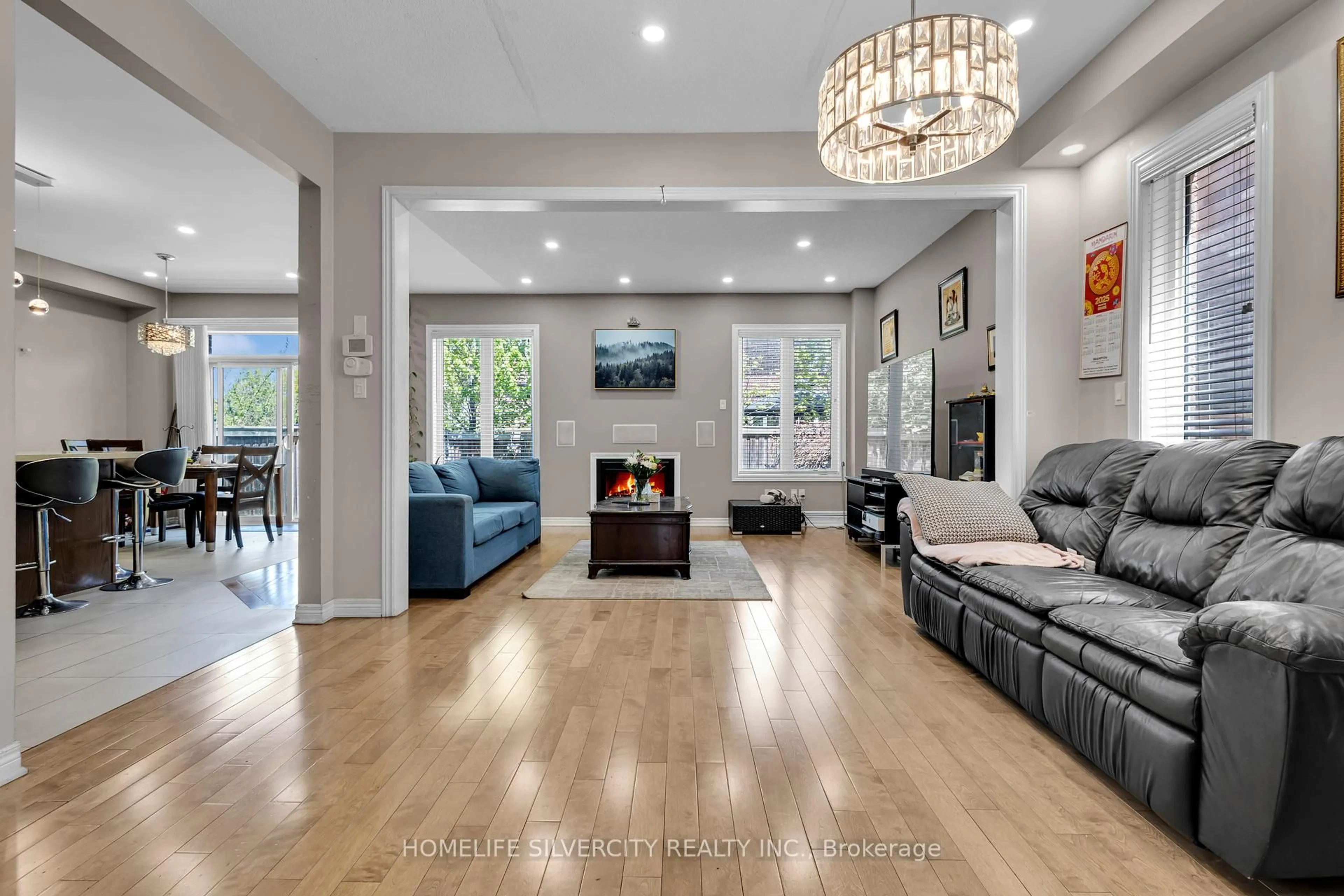 Living room with furniture, unknown for 38 George Robinson Dr, Brampton Ontario L6Y 0G8
