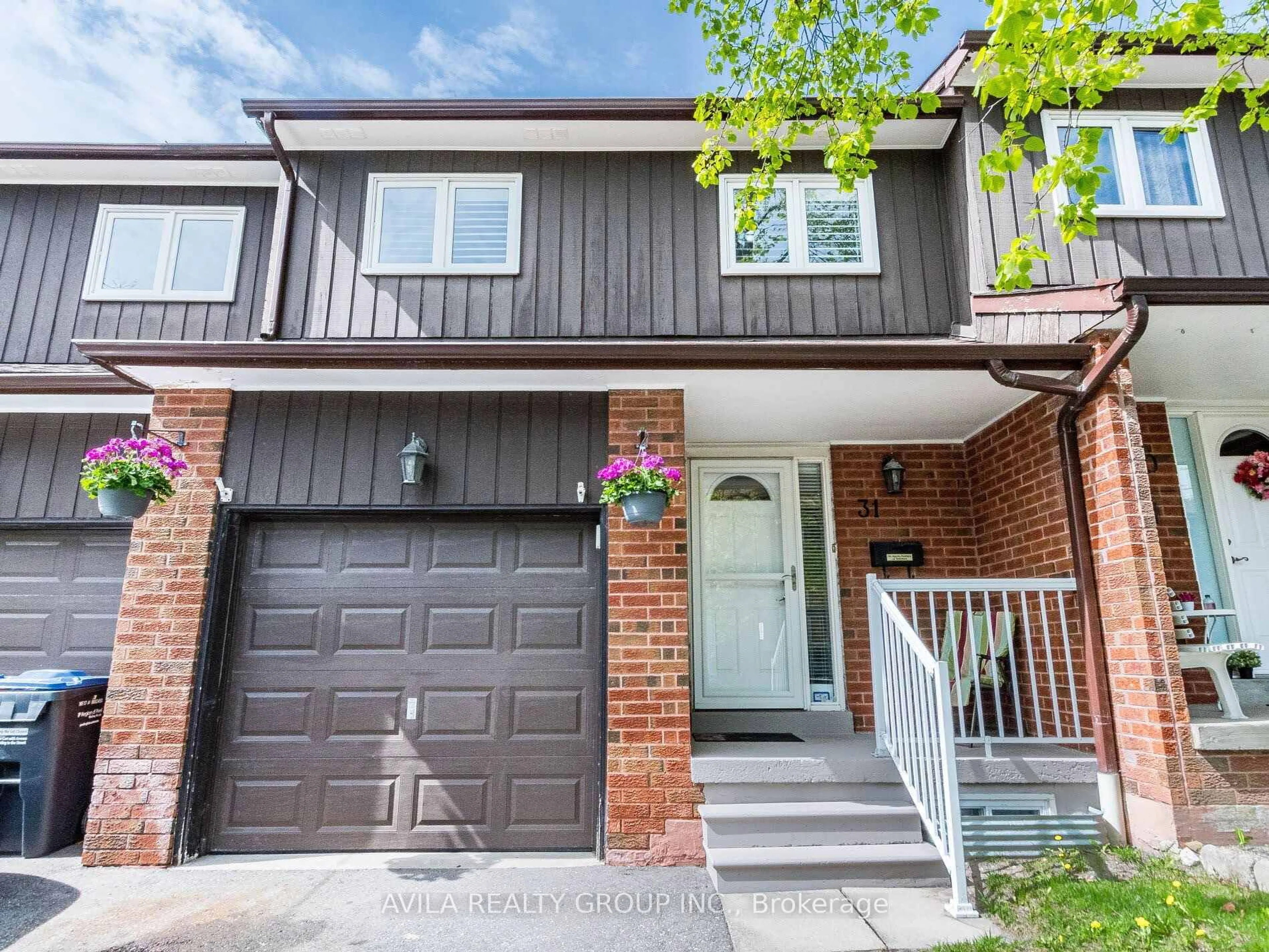 Home with brick exterior material, street for 750 Burnhamthorpe Rd #31, Mississauga Ontario L4Y 2X3