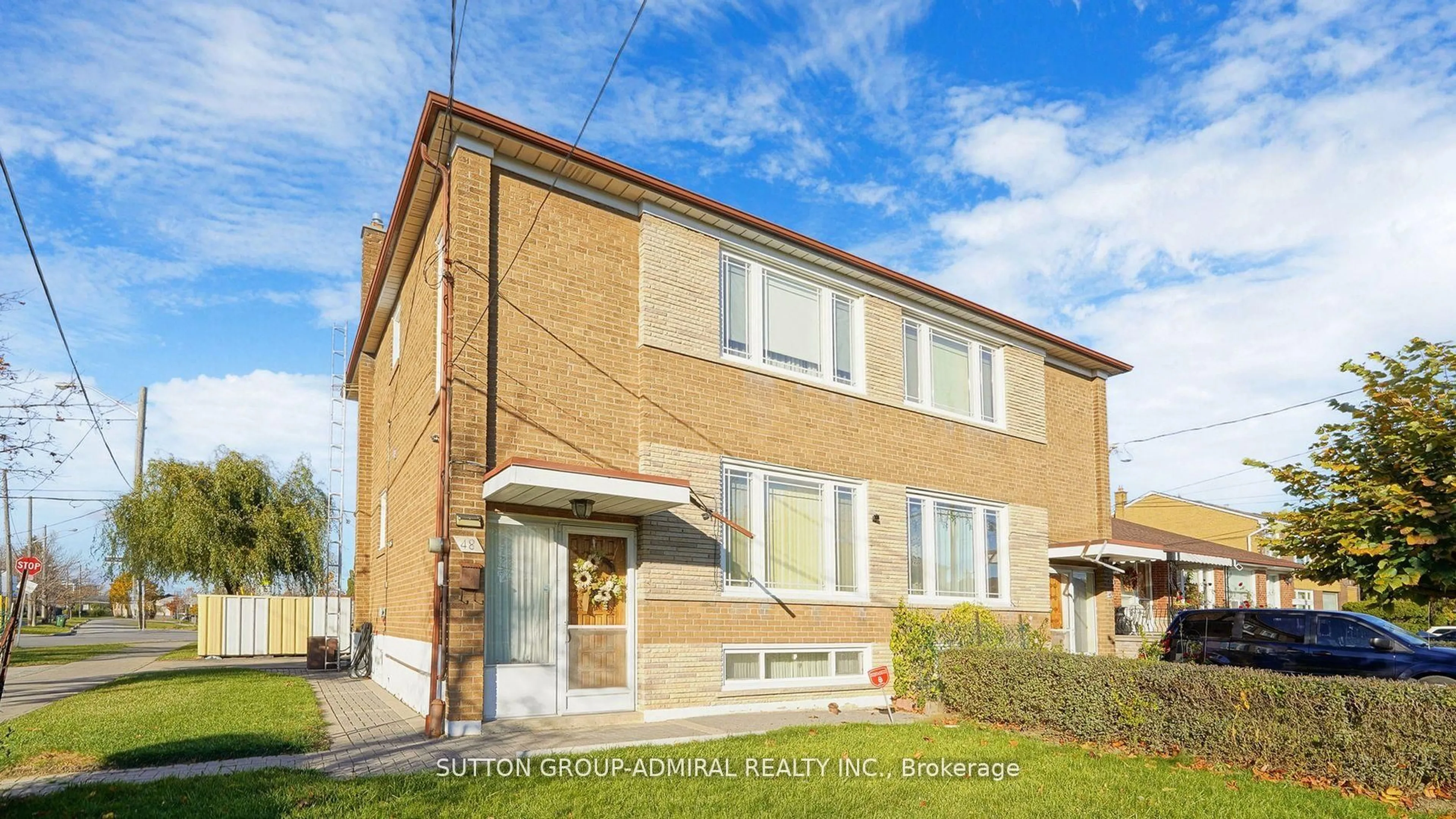 Home with brick exterior material, street for 48 Dubray Ave, Toronto Ontario M3K 1V5