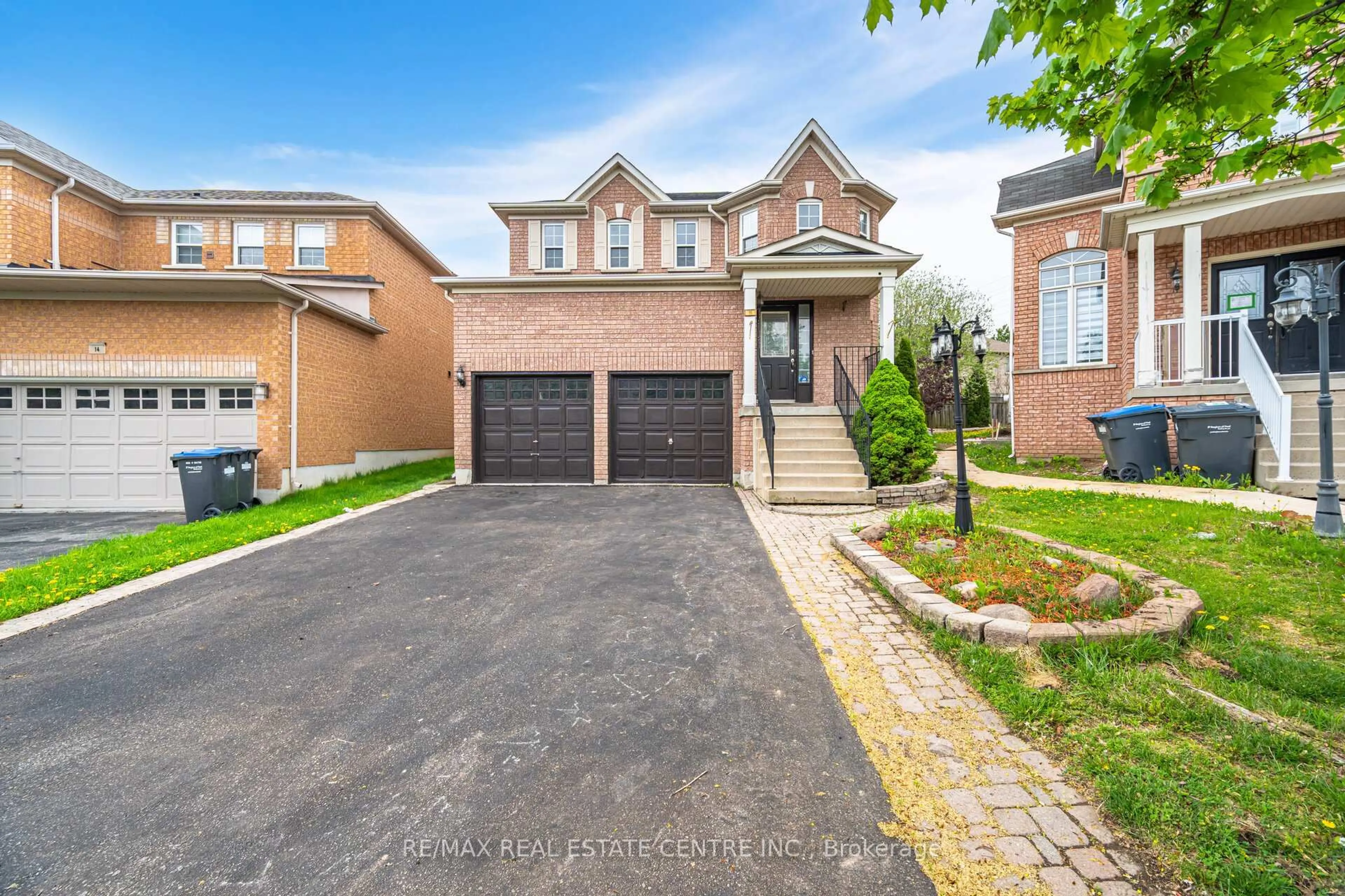 Home with brick exterior material, street for 16 Mistycreek Cres, Brampton Ontario L7A 3E8