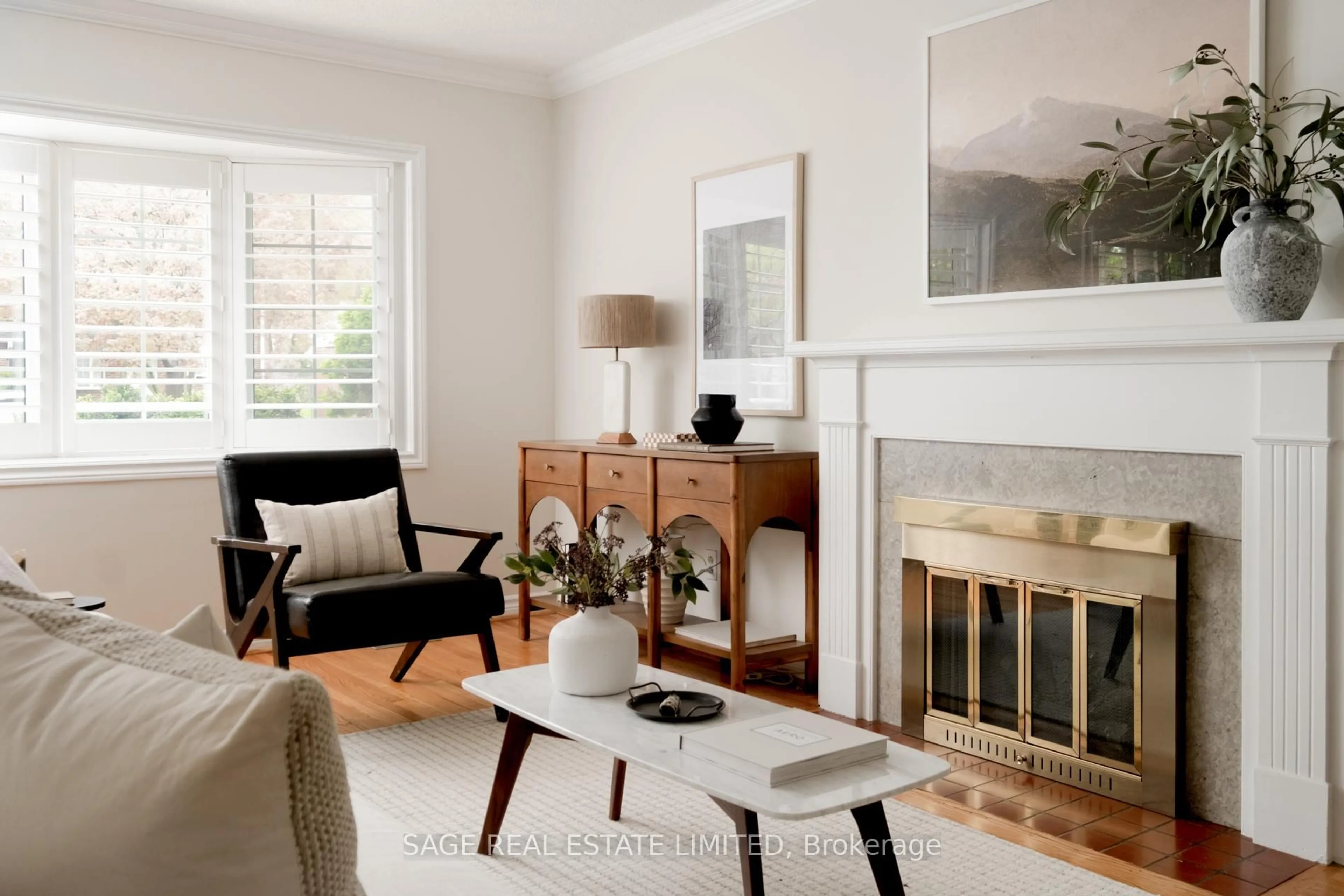 Living room with furniture, wood/laminate floor for 52 Glen Agar Dr, Toronto Ontario M9B 5M1