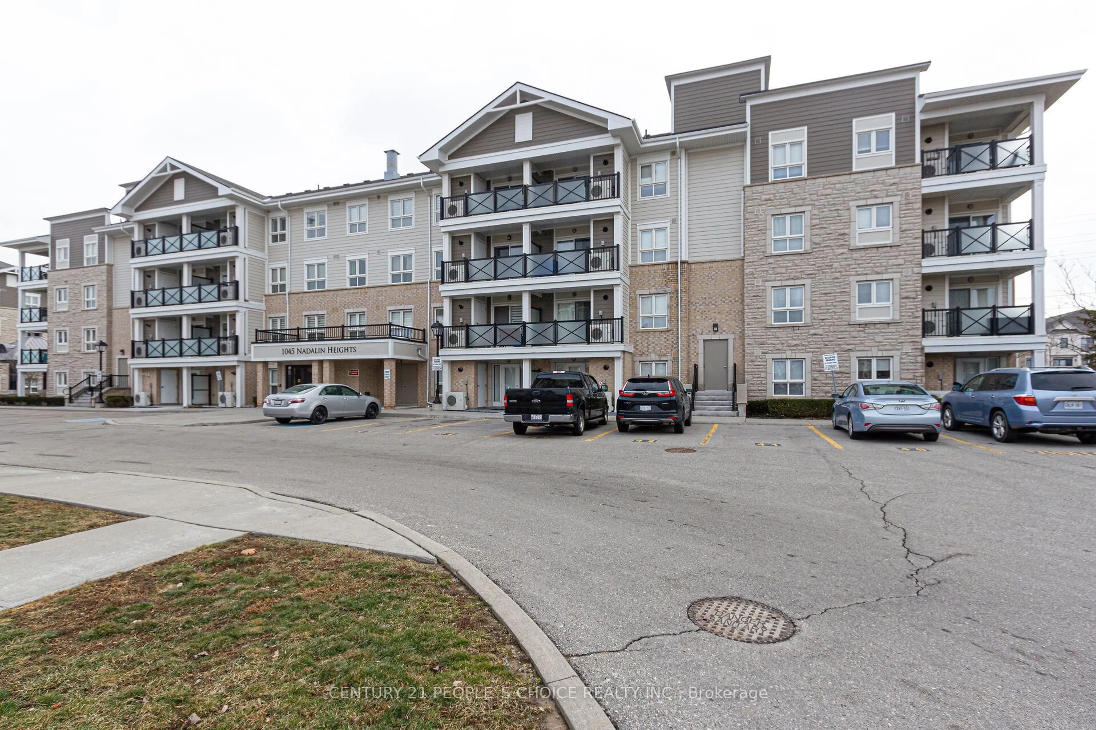 A pic from outside/outdoor area/front of a property/back of a property/a pic from drone, building for 1045 Nadalin Hts #211, Milton Ontario L9T 8R5